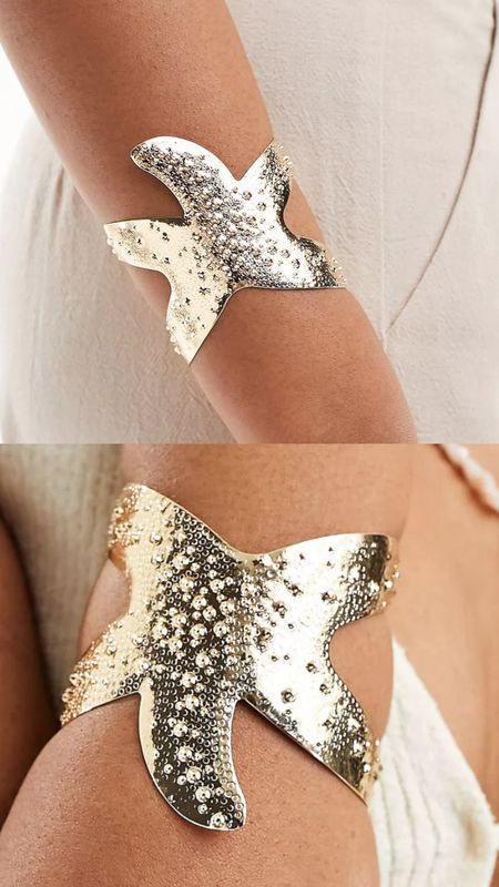 Cuff bracelet with textured starfish design in gold tone.  Summer accessory. Under £10. 
Affordable fashion.  Statement piece. Holidays, vacation, sea. Gift guide idea for her. Elegant,  chic look, feminine fashion, trendy look.




#LTKsummer #LTKeurope #LTKuk