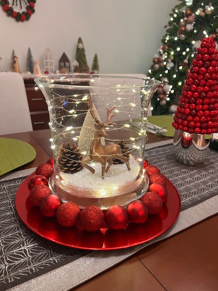 DIY Christmas decor ideas. Center table scape. Dining table. Target holidays. Reindeer, Pine cone, snow, charger, mini ornaments, fairy light, Christmas tree. 

#LTKHoliday #LTKhome #LTKSeasonal