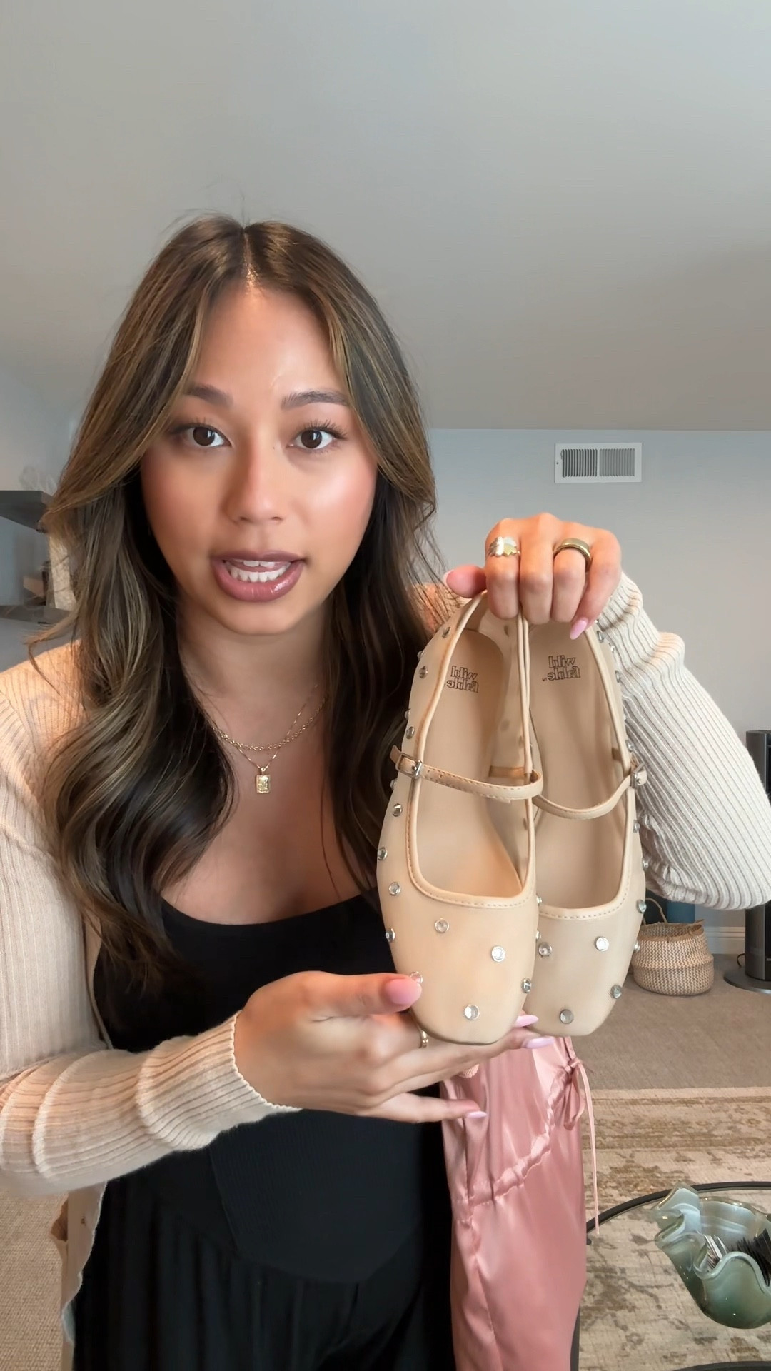 obsessed with this flowy romper from aerie! wearing size small and still has room for the bump to grow 🖤 | black romper | bump friendly | maternity wear | maternity style | pregnancy fashion | pregnancy style | nude ballet flats | rhinestone ballet flats | ballet core | casual outfit | spring outfit 

#LTKFindsUnder50 #LTKStyleTip #LTKBump