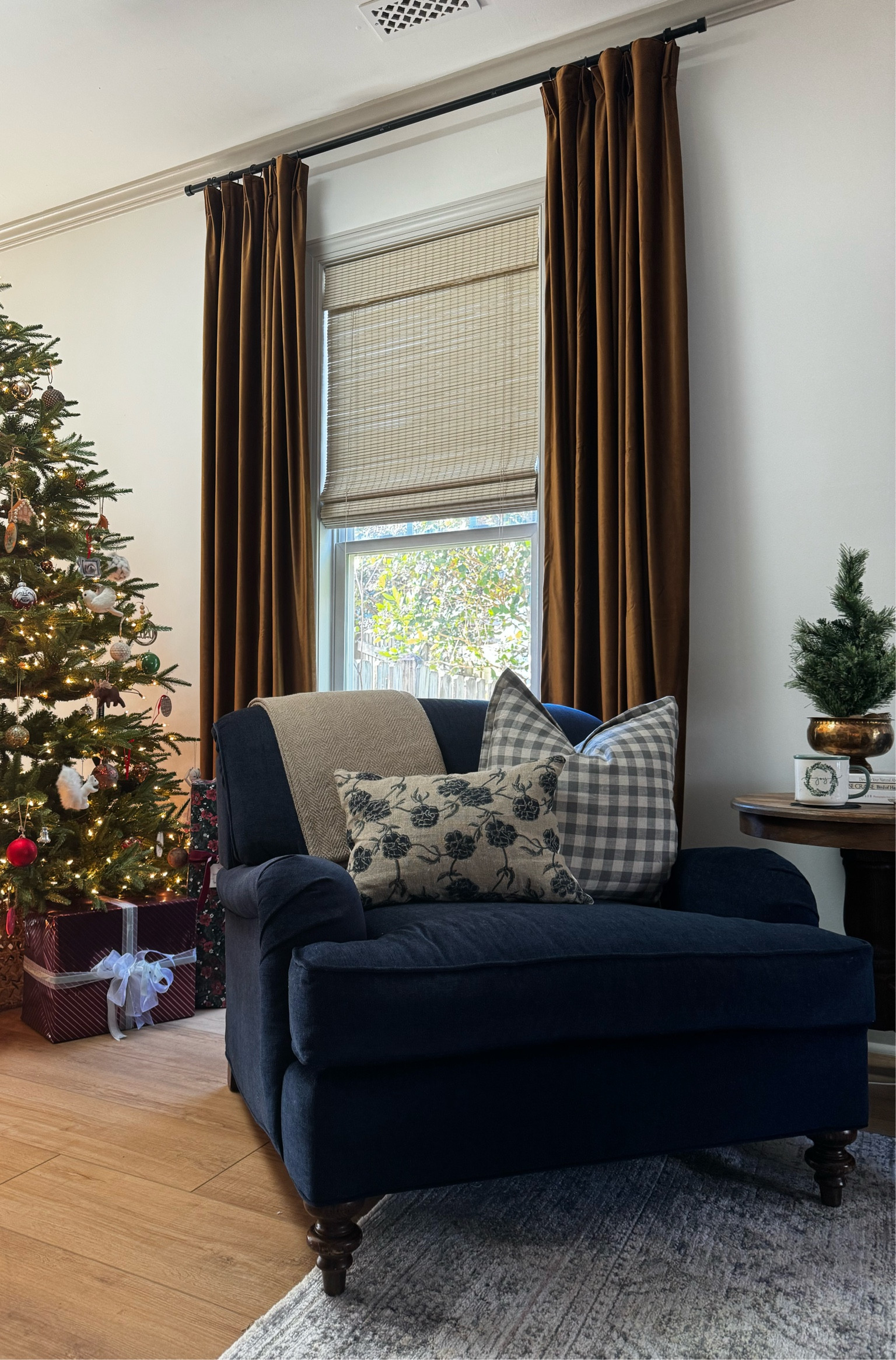 Cozy living room // cozy core // transitional living room // navy arm chair // gold curtains // velvet curtains 

#LTKhome
