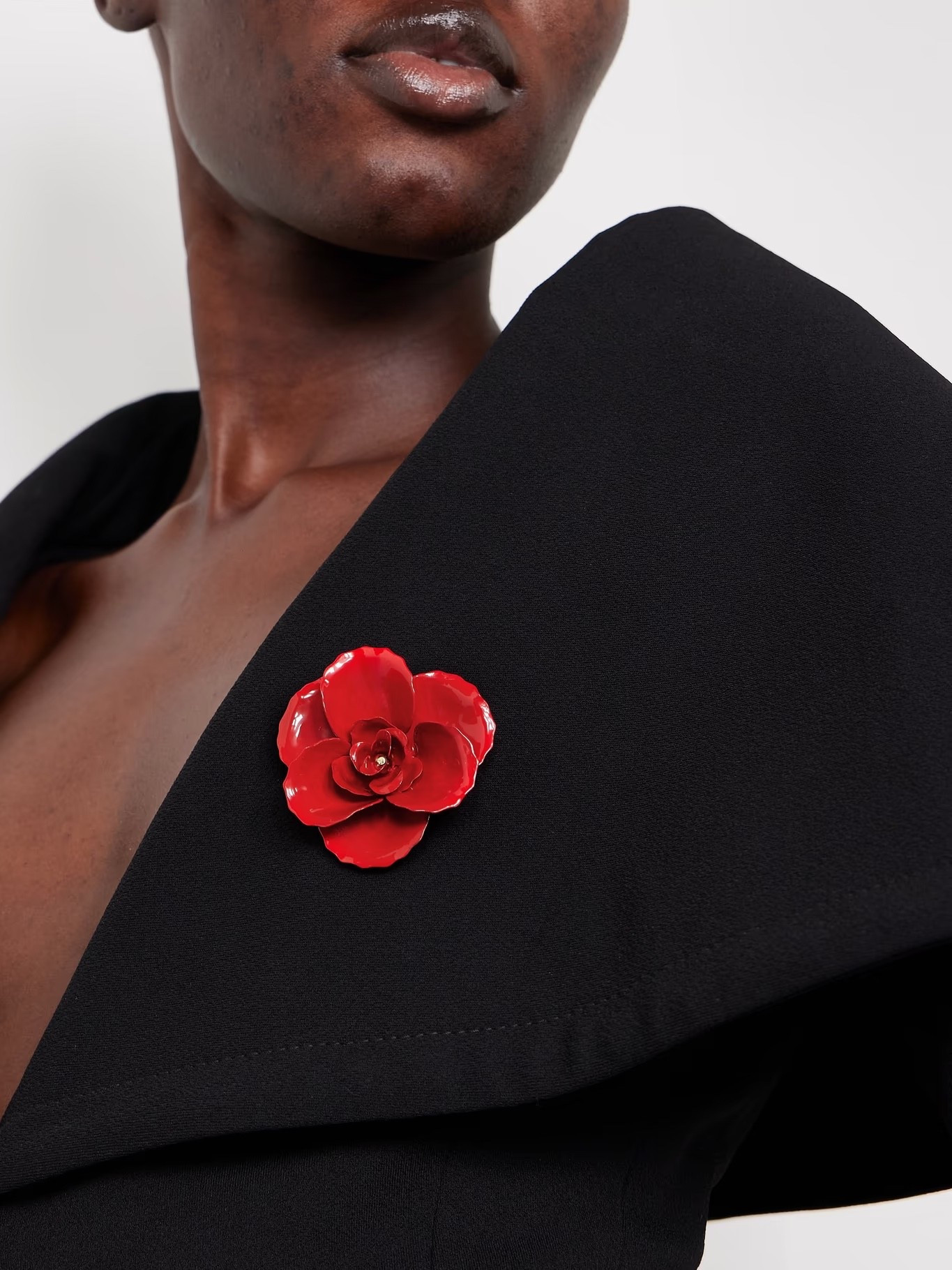 Adding effortless interest to your Winter looks with a brooch! 
