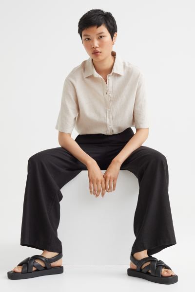 Conscious choice  New ArrivalTailored, slim-fit trousers in a linen and viscose weave with wide, ... | H&M (US + CA)