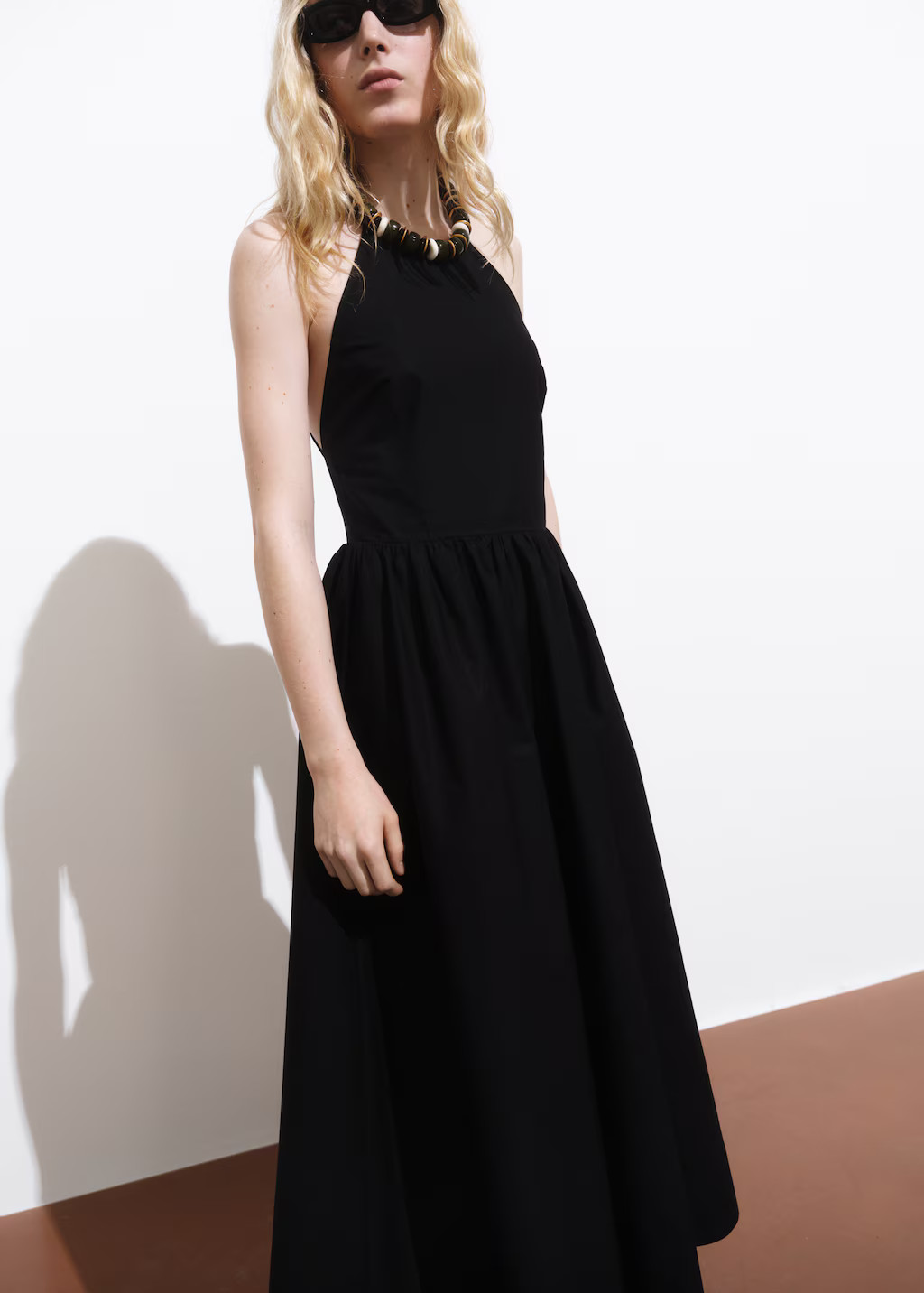 Halter dress with crossed back - Women | MANGO United Kingdom | MANGO (UK)
