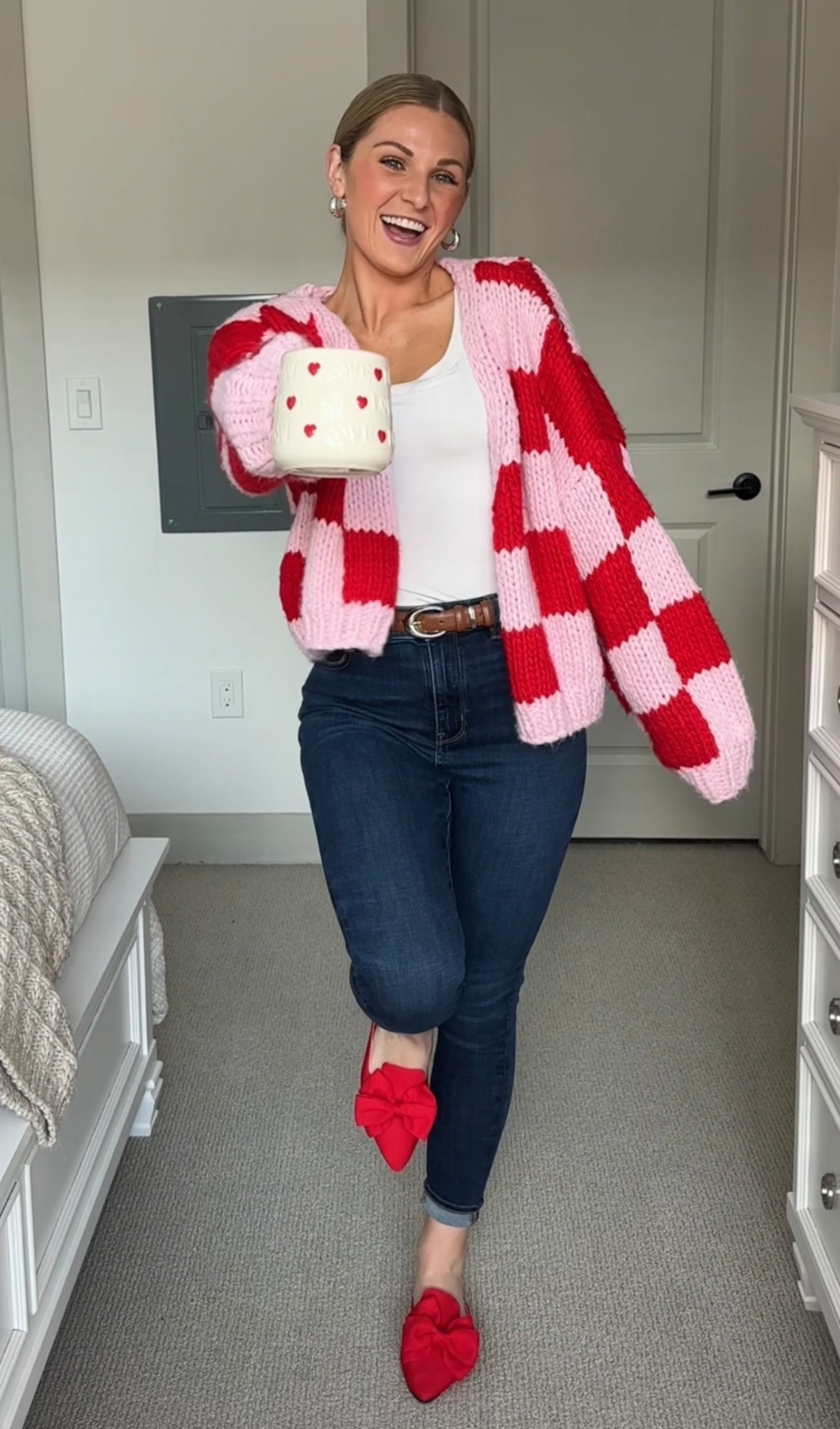 The perfect Valentine’s Day fit - chunky knit cardigan, basic white long sleeve, skinny jeans and red shoes🤭💖

#LTKValentine #LTKWorkwear #LTKBeauty
