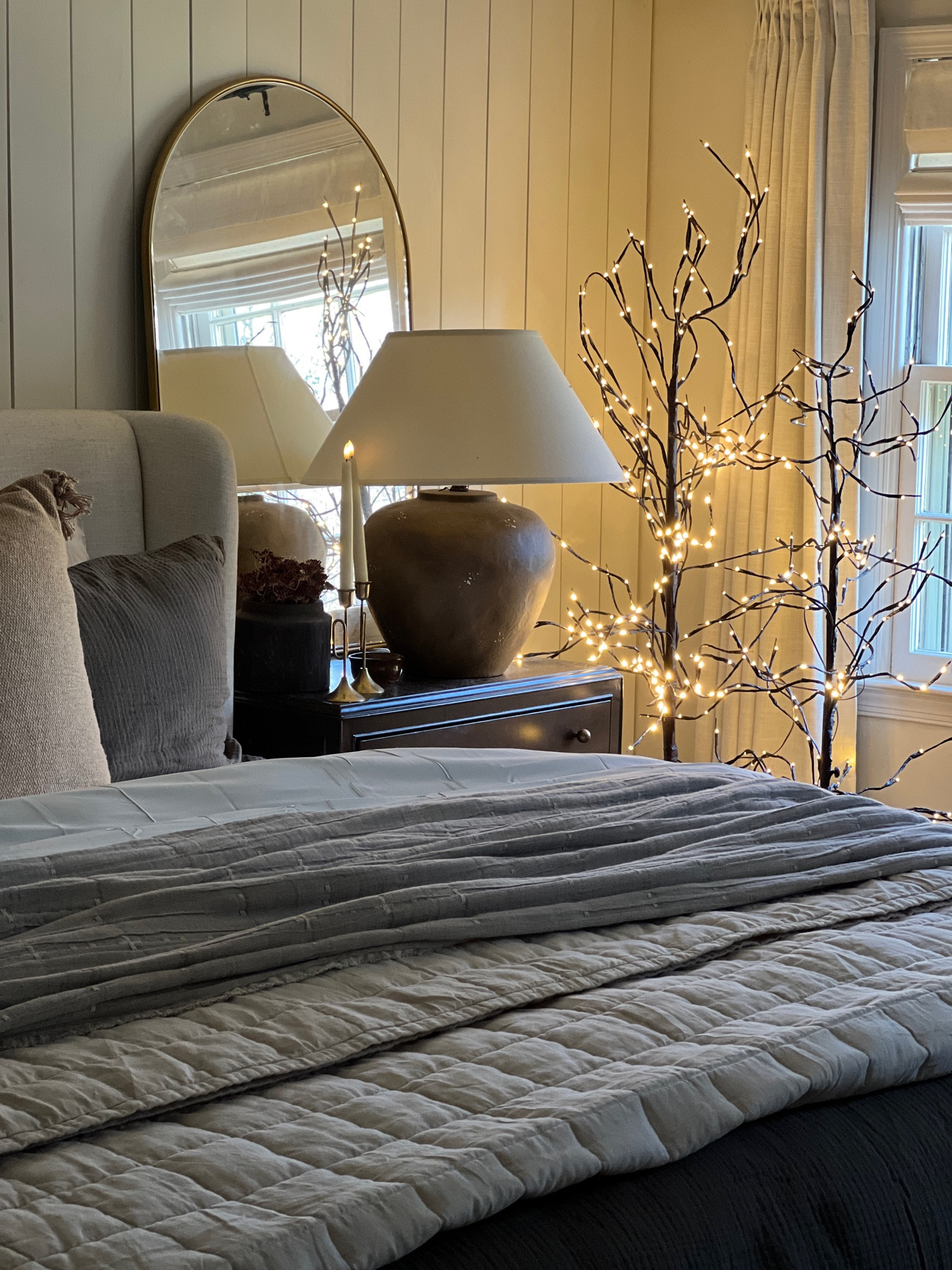 Cozy winter bedroom styling inspo. Layered bed. Shiplap wall. Brass mirrors. Neutral transitional home decor organic modern linen bedding. Calabria table lamp. Twinkle trees.

#LTKSeasonal #LTKHome #LTKHoliday