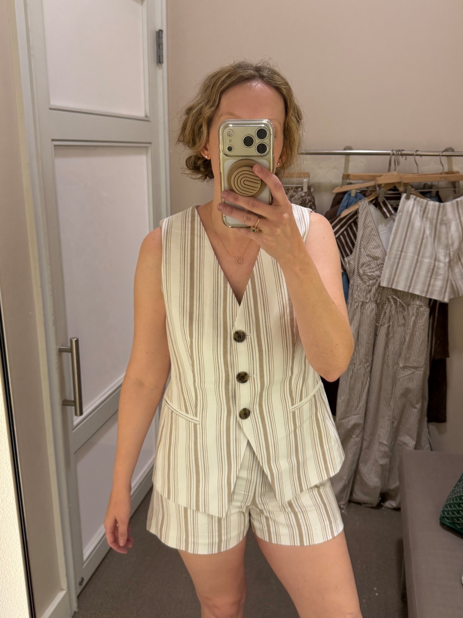 Would wear a size 4 in vest and 6 in shorts 