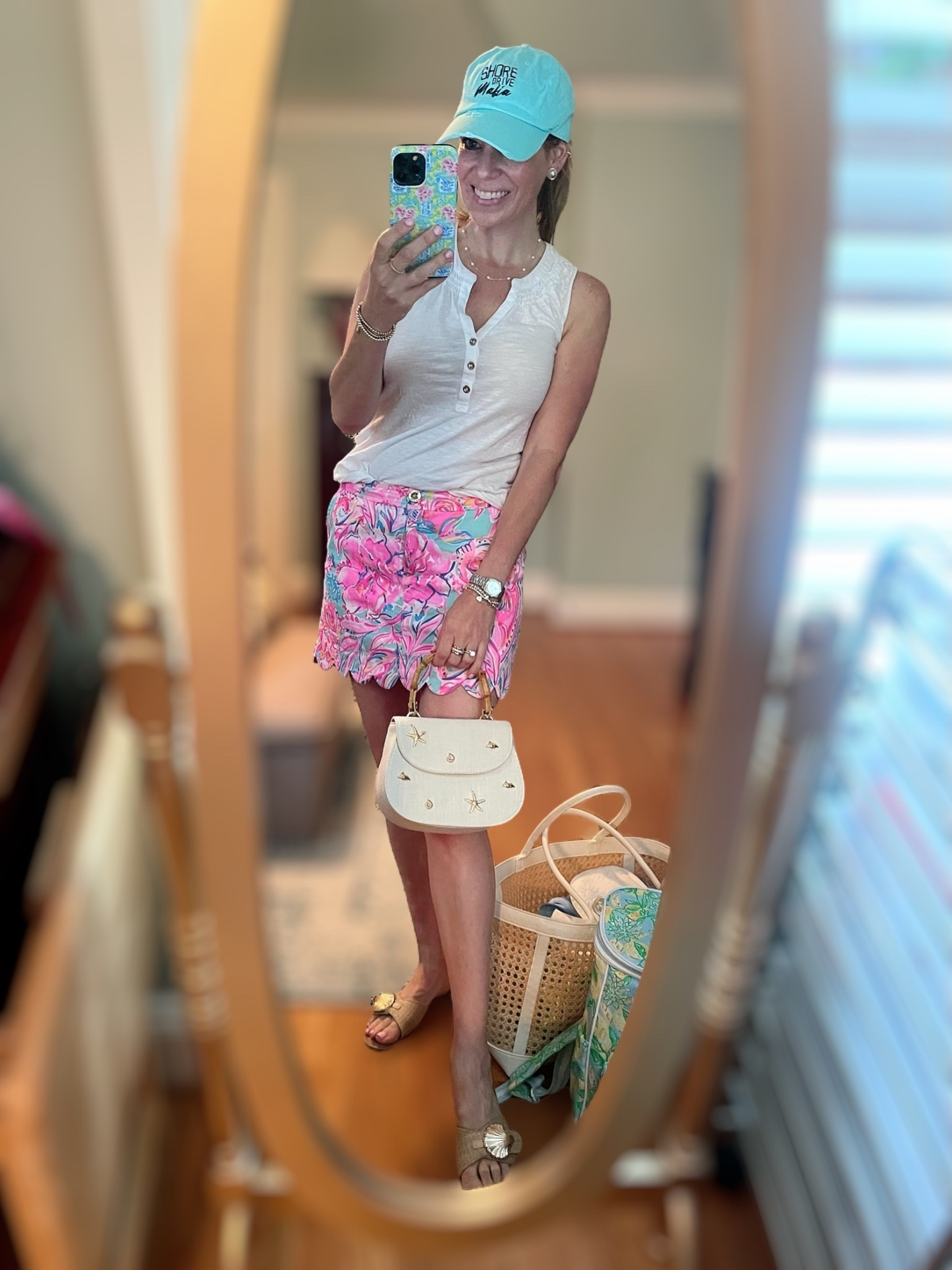 🌸 Coastal cuteness with a pop of pink 💚☀️
Wearing the classic Lilly Pulitzer skort in a vibrant pink and green print (size 0) — the ultimate summer staple! Styled with a white henley tank (linked similar), Target gold shell sandals, and my Shore Drive Mafia hat 🧢. Finished off the look with a mini starfish bag 🐚 and my favorite Melinda Maria jewelry — use code PREPPYREBEL for 10% off! 💫

🎀 Accessories:
• Mini starfish top handle bag
• Rattan beach tote
• Melinda Maria necklace, bracelets & rings (code PREPPYREBEL ✨)

📏 Wearing size 0 in skort | Tank is linked similar
👡 Sandals are Target gold shell slides
🧢 Hat is Shore Drive Mafia

#LillyPulitzerStyle #PREPPYREBEL #MelindaMariaJewelry #LTKunder100 #TargetStyle #BeachTownStyle #CoastalOOTD #LTKsummer #ShoreDriveMafia #LTKfinds

#LTKItBag #LTKShoeCrush #LTKFindsUnder50