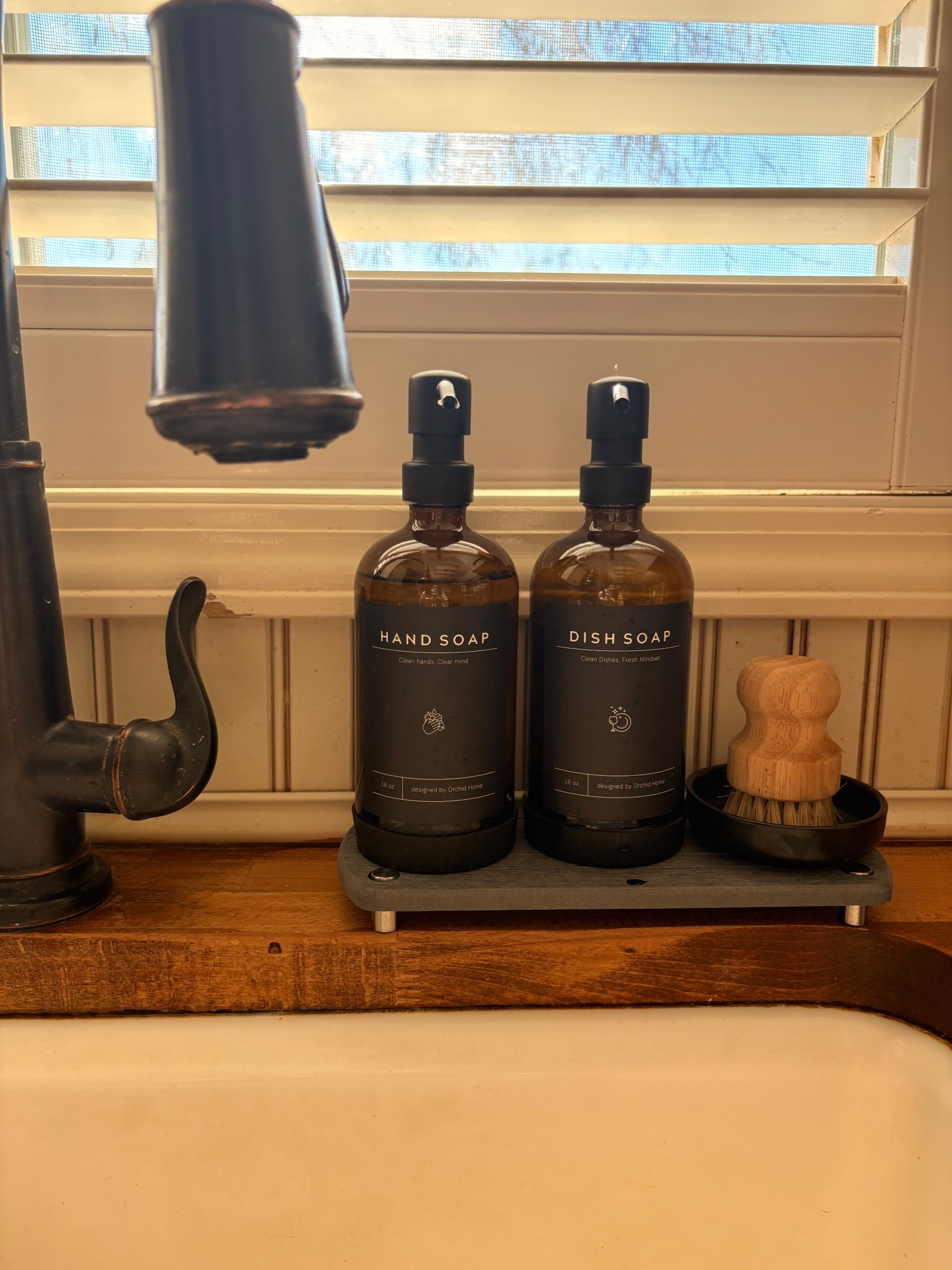 Elevating everyday basics 🤍 This Amazon dish + hand soap dispenser set keeps my sink area organized and clutter-free with refillable glass bottles, a slim drying tray, and a spot for the brush. Functional, clean, and actually pretty. Comes in multiple bottle colors, hardware finishes, and label options so you can customize it to your kitchen style. A small upgrade that makes daily routines feel more intentional.

#LTKfoodie #LTKHome #LTKdayinmylife