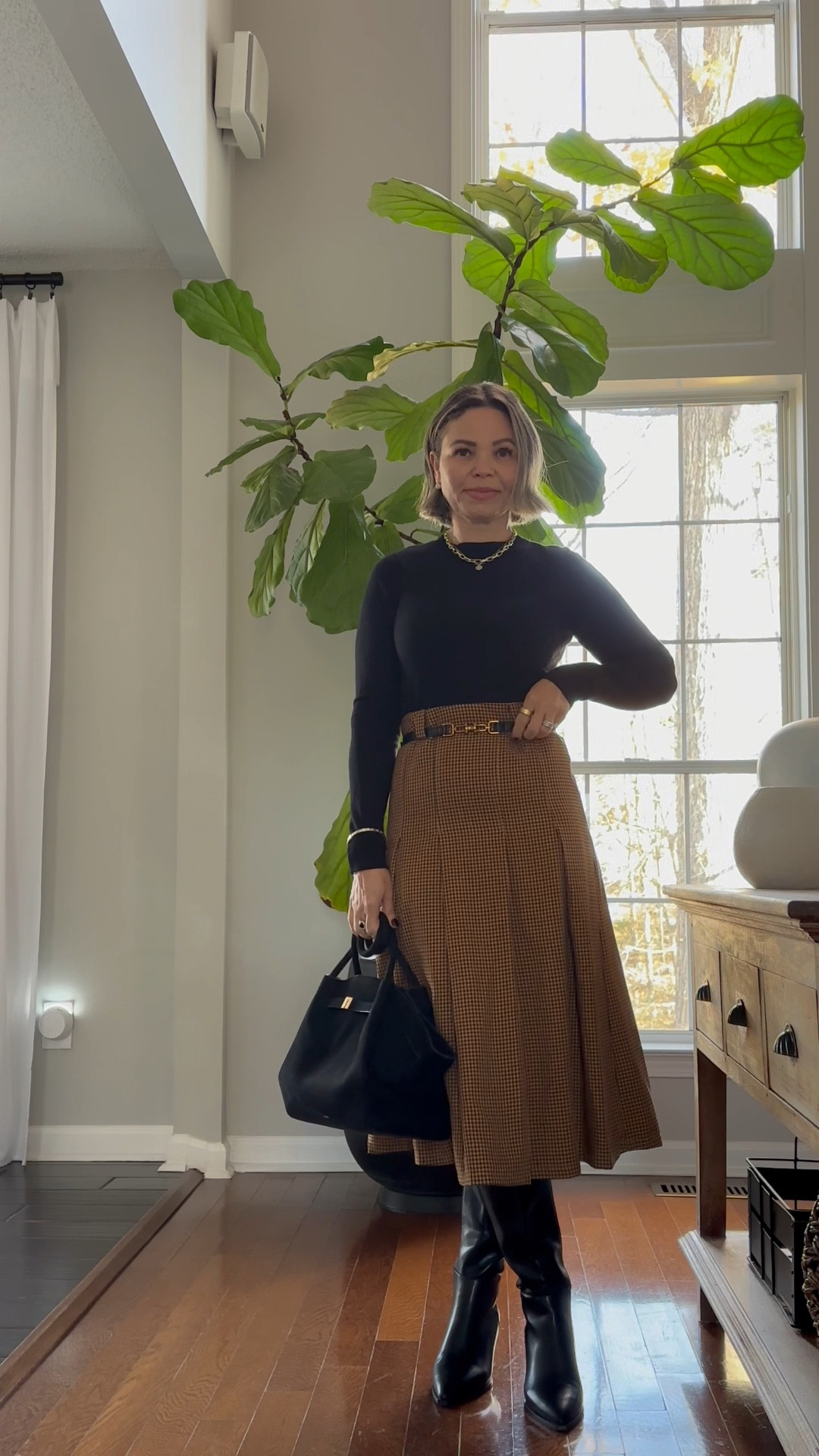 Winter outfit 
Midi skirt paired with black cashmere sweater, knee high boots ( these  are kitten heels so comfortable) suede bag topped with wool long coat 

#LTKHoliday #LTKgrwm #LTKSeasonal