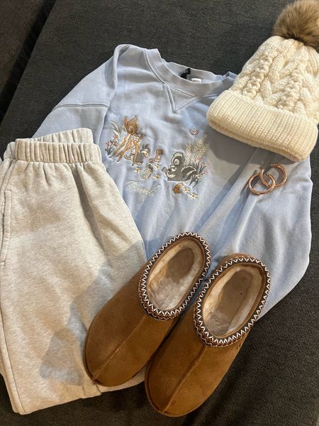 Bambi sweater, beanie, ugg slippers, grey sweats, gold accessories

Not Linked:
Brandy Melville “Rosa Sweatpants” - Light Heather Grey

Bambi Sweater - H&M