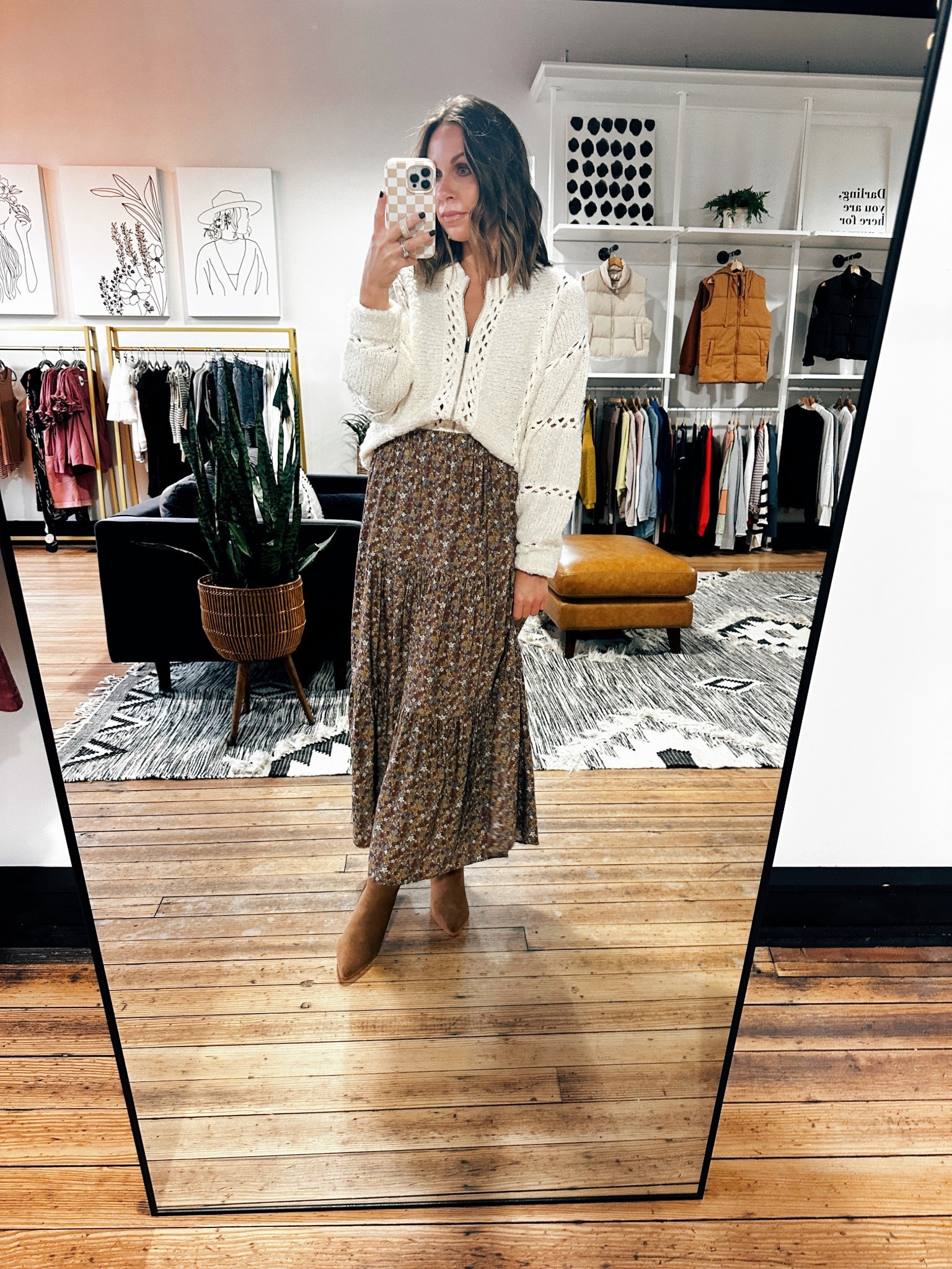 Skirt and Top are VerClare Boutique. Sizes up half size in boots! 