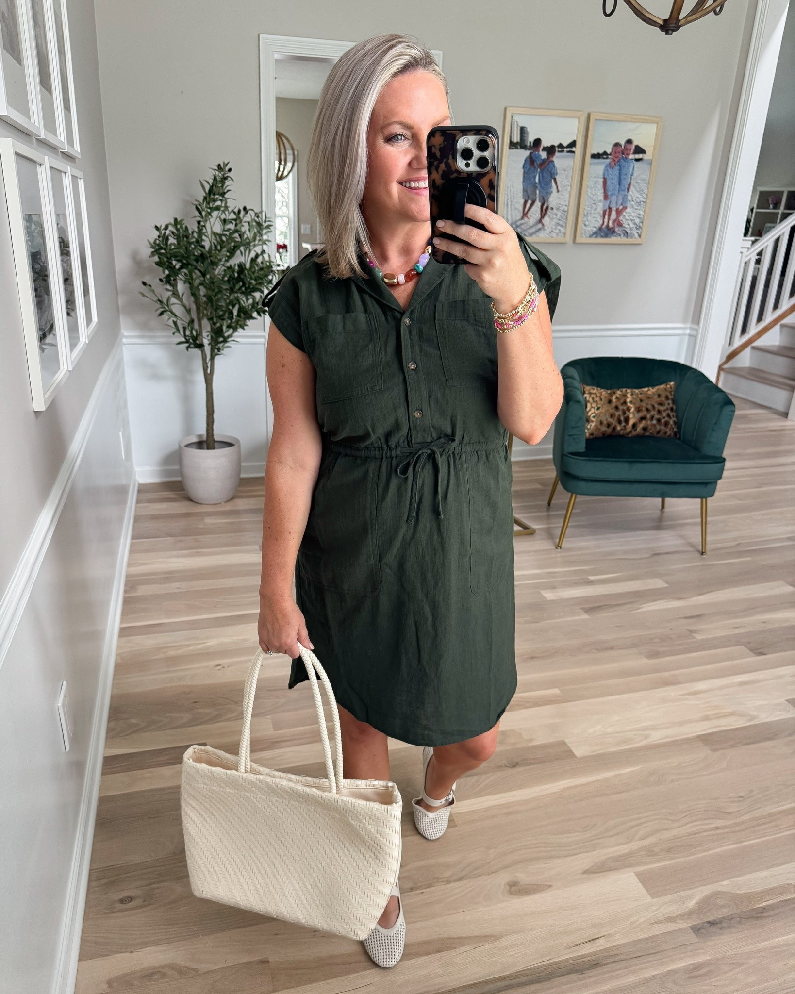 This deep olive dress is such a good option for right now because the color feels like fall, but the lightweight fabric and short sleeves still work in the heat. The drawstring waist gives it shape without making it feel too structured, and I love it with woven flats and a neutral tote.

olive dress, green dress, drawstring waist dress, casual fall outfit, transitional dress, lightweight dress, everyday style, teacher outfit, woven flats, lovelylifestyling

#LTKdayinmylife #LTKootd #LTKSeasonal