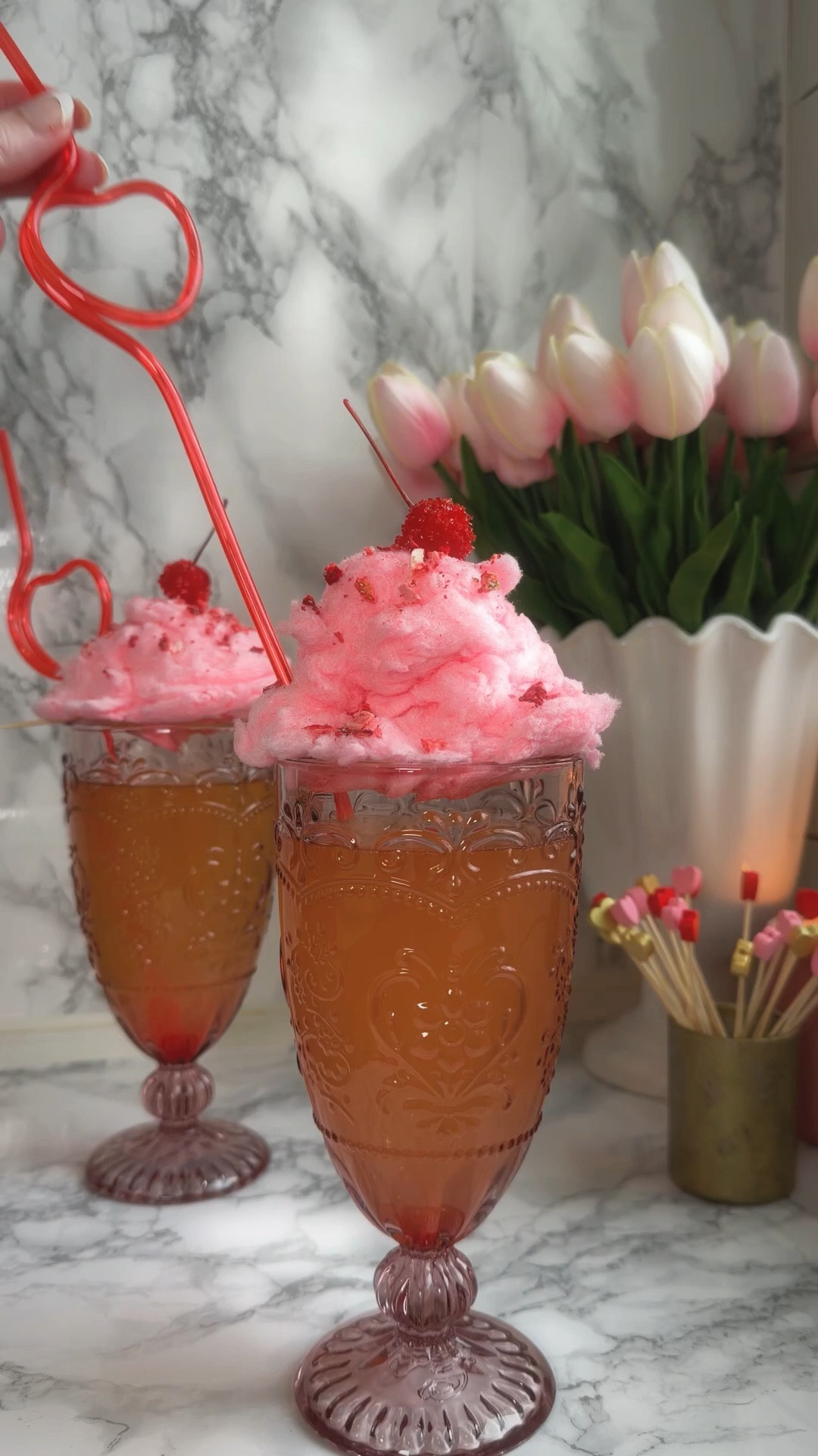 Strawberry Cotton Candy Moscato using Moscato wine, cotton candy, dried strawberries, and pink glassware. All items linked for an easy Valentine’s drink idea!💗

#LTKValentine #LTKHome