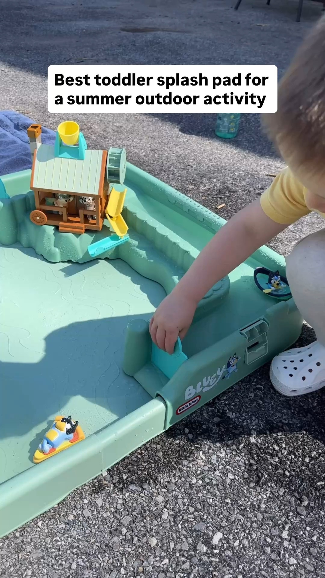 Looking for the best toddler water table or splash pad for summer? This outdoor bluey water toy is a perfect activity for keeping toddlers busy, entertained, and off screens.

Great for backyard fun, playing, hot weather activities, and easy summer fun ideas for kids.

Grab this must have summer bluey splash pad toy!