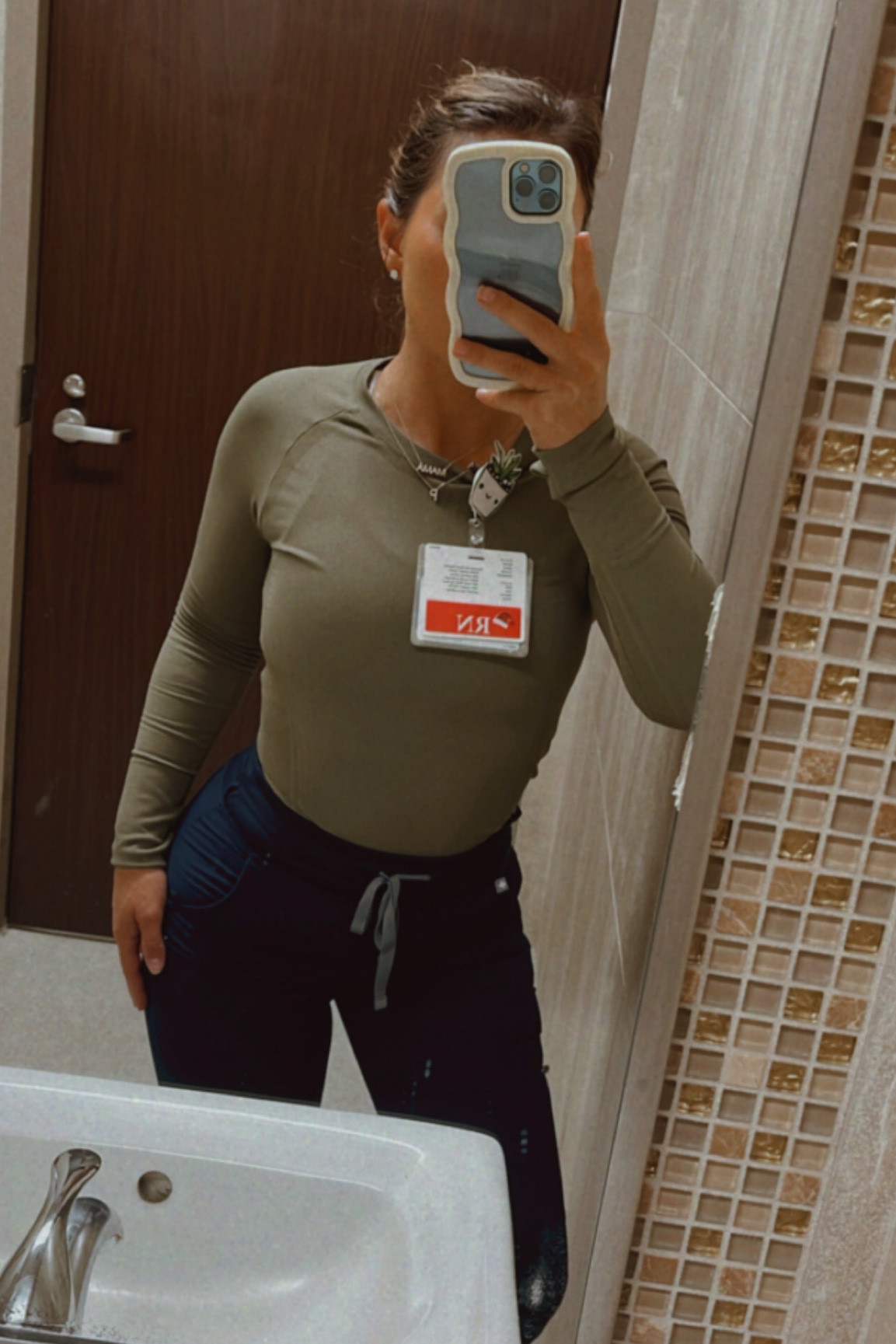 Love this olive color! 🤎🌿 #nurse #scrubs #ootd #ltkootd #work 

#LTKFind #LTKworkwear #LTKfit