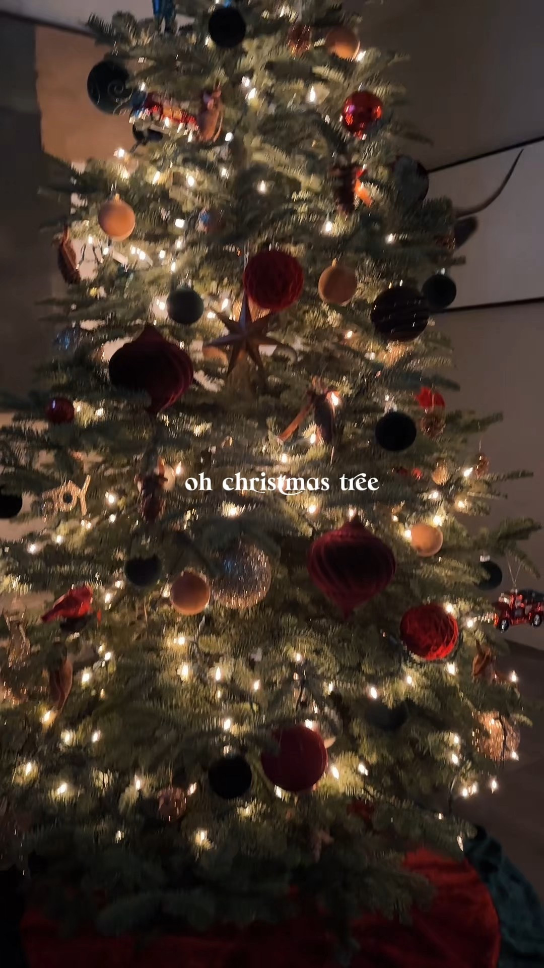 Modern rustic and warm Christmas tree! Lots of textures, sizes, and of course, sparkle! Christmas decor. Holiday indoor. Ornaments. Bows. Twinkle lights. Burgundy. Dark Green. Gold. 

#LTKSeasonal #LTKHome #LTKHoliday