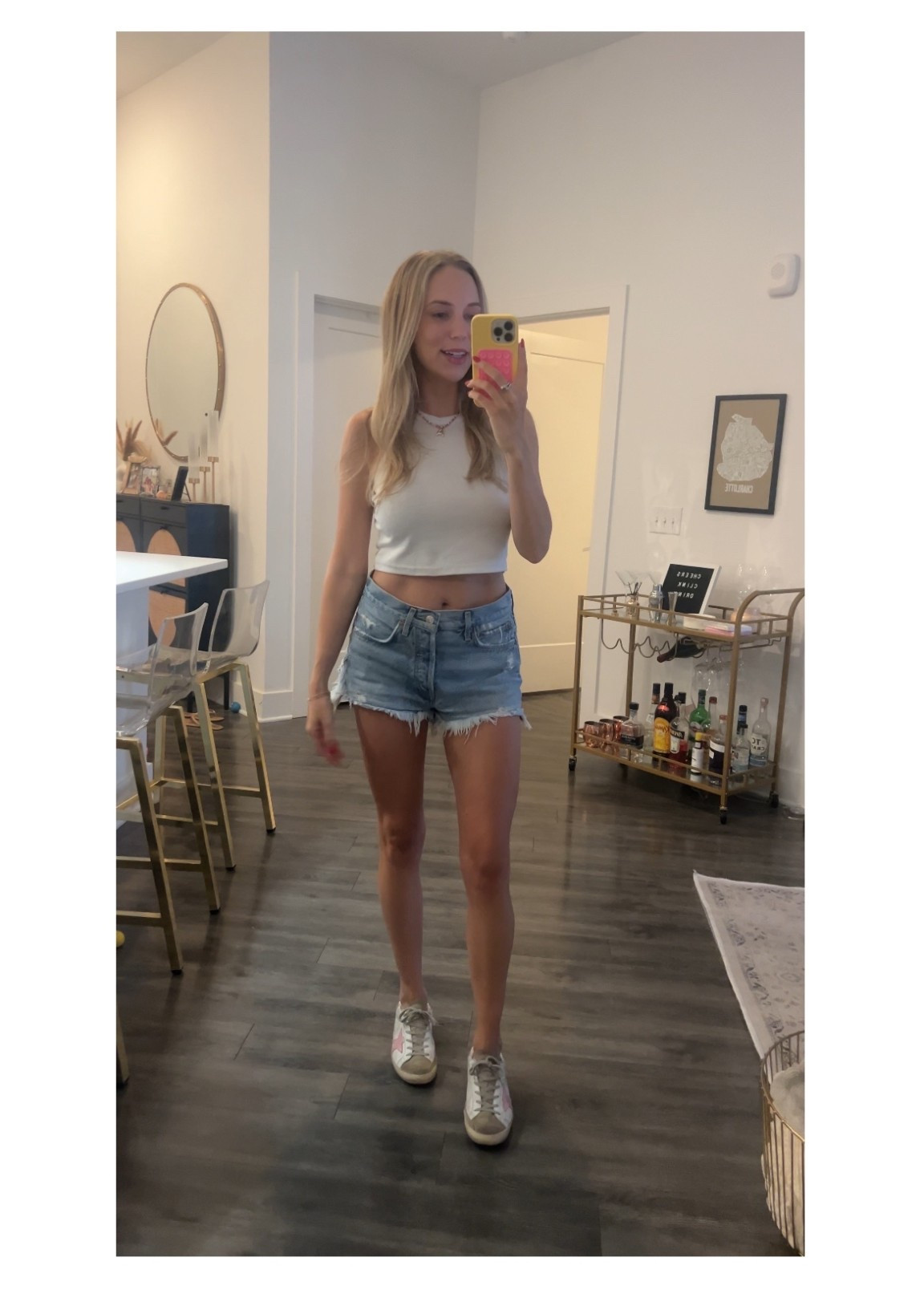 White tank top, denim shorts, golden goose sneakers 