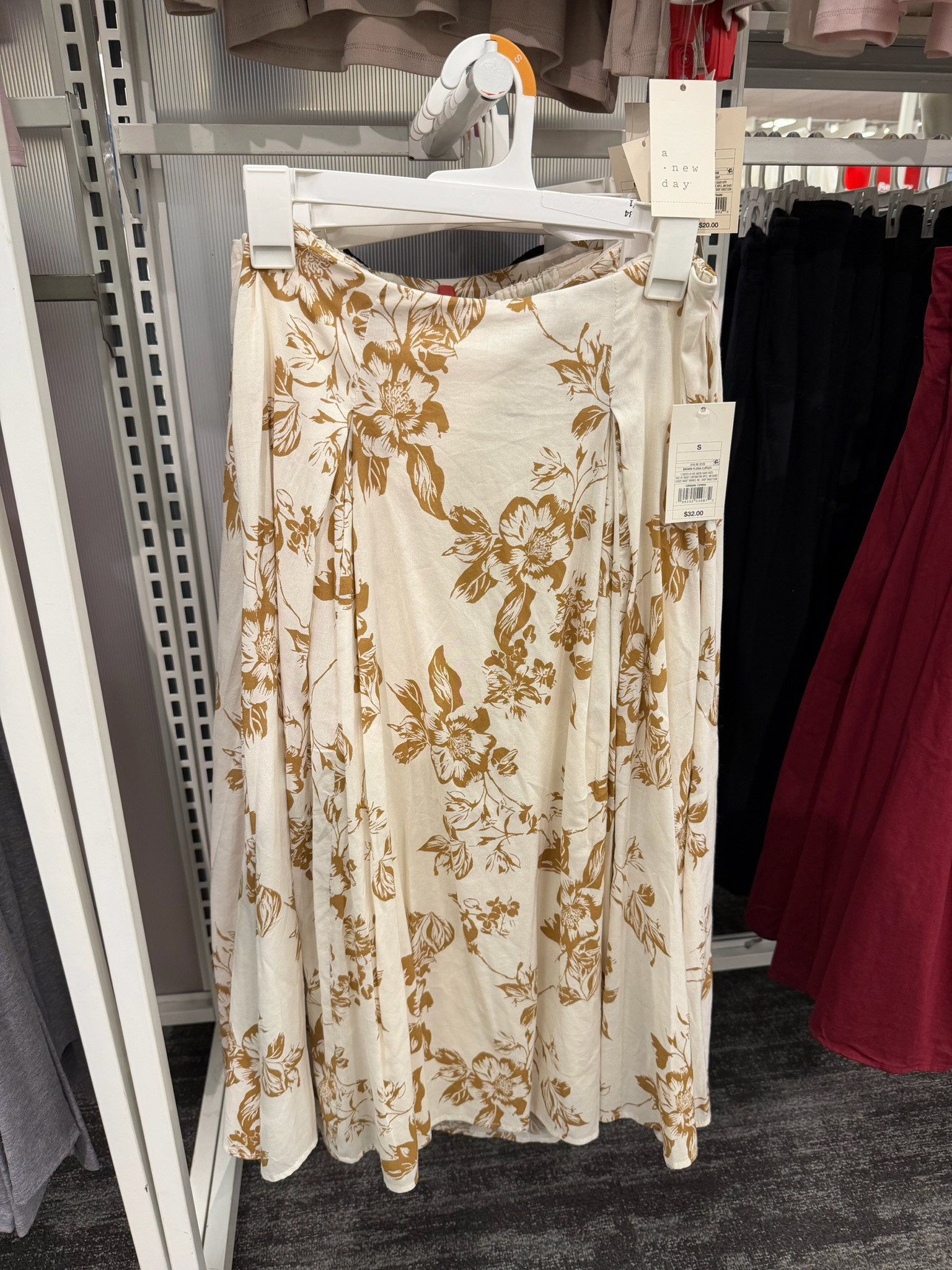 This skirt feels like spring in one piece 🌿 The A New Day pull-on pleated voile midi skirt has the prettiest flow and that soft neutral floral that makes it so easy to style. I love that it’s lightweight with an elastic waist, so it’s comfortable but still looks polished. Pair it with a fitted tank and sandals for vacation outfits beach vibes, or dress it up with a knit and flats for work outfits or business casual workwear. It’s one of those pieces you can wear now and straight into warmer weather.
date night outfits, winter denim, vacation outfits beach, work outfits, resort wear, easter basket boys, plus size fashion, business casual workwear, sunday hoodie, rodeo outfit inspo, floral midi skirt, spring outfits, modest fashion, neutral style, target new arrivals 

 #LTKgrwm #LTKootd #LTKWorkwear