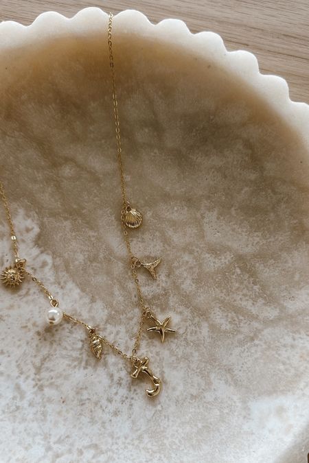 The personalized prettiest dainty charm necklace for summer  from amazon 🐚 🌞 under $15

#amazonfind #amazon #charmnecklace #charm #shell #sun #initial #mermaid #summernecklace #summerjewlery #pearl 

#LTKFindsUnder50 #LTKSeasonal #LTKStyleTip