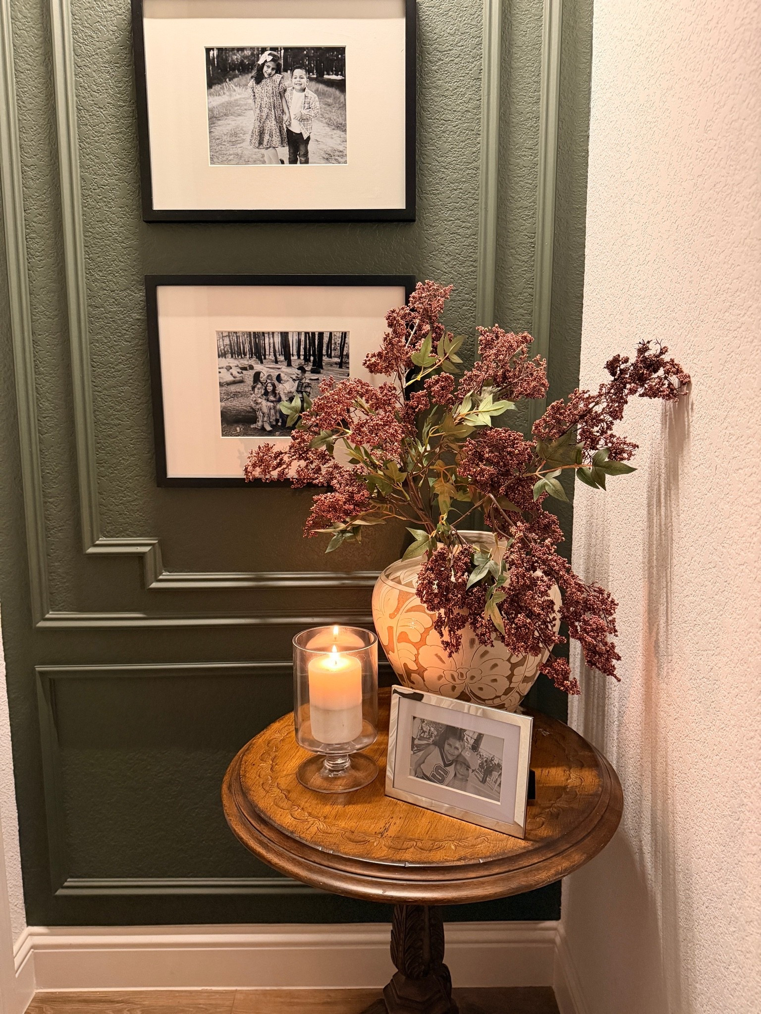 Entryway decor | Entryway inspiration | Foyer decor | Traditional home | Transitional home | Collected home | Gallery wall | Family photo wall | Picture frames | Accent table | Pedestal table | Side table decor | Fall florals | Faux fall stems | Fall vase | Ceramic vase | Candle decor | Warm wood tones | Moody green wall | Wall molding | Picture frame molding | Cozy home | Timeless interiors | Vintage inspired decor | Fall home decor | Home styling | Nancy Meyers style

#LTKdayinmylife #LTKHome #LTKSaleAlert