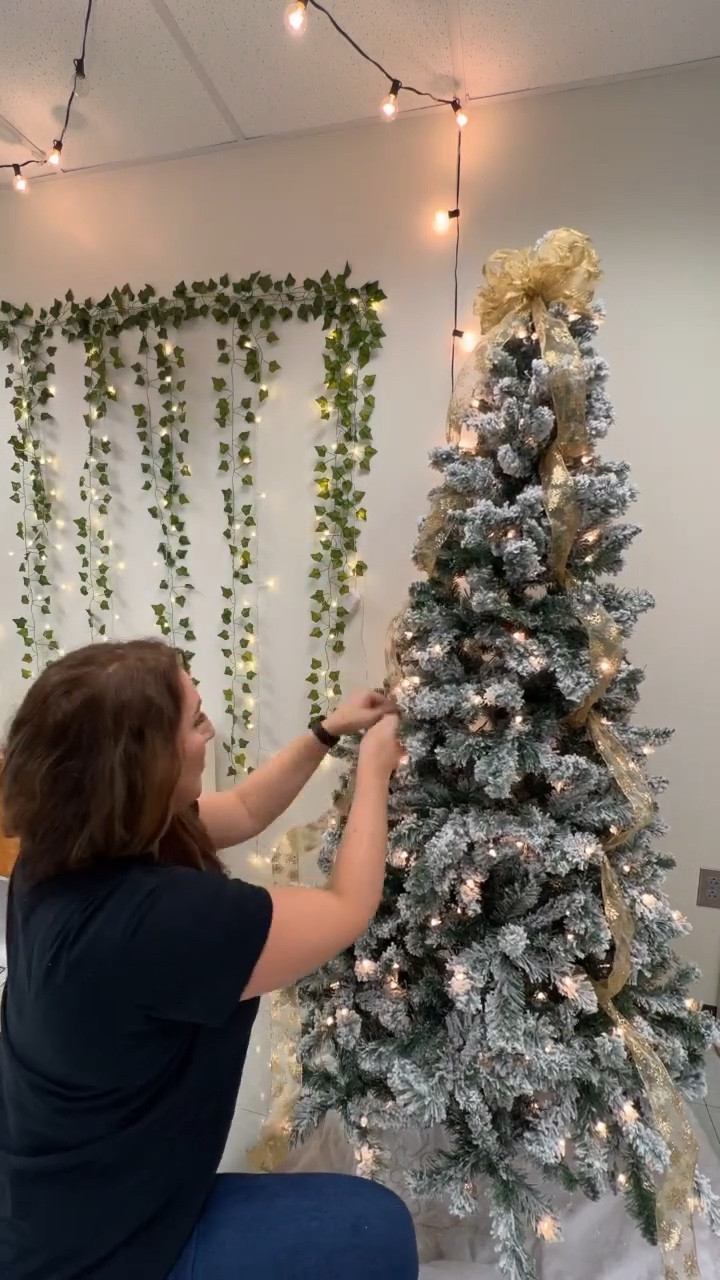 Christmas Tree Ribbon Tutorial- a small, inexpensive step that makes a big difference! This is the tree I used to have in my classroom so it was easier to do it on than a big tree!

#christmas #christmastree #christmastreetutorial #tutorial #ribbon #homedecor #christmasdecor