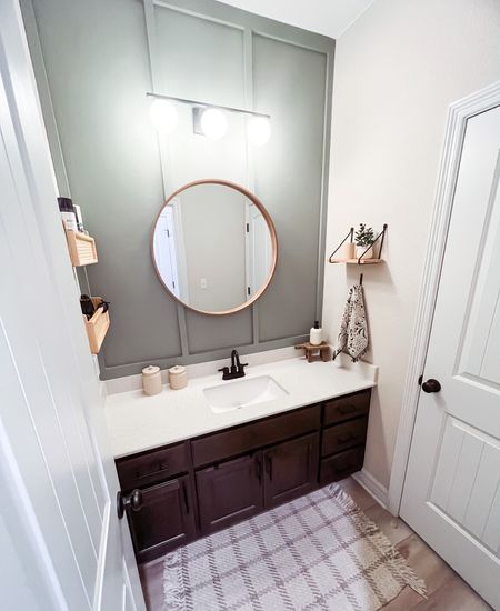 A little magic dust on this guest bath 🫶🏻💫

🎨 Evergreen Fog by @sherwinwilliams 
LINK 🔗 in BIO for supplies & to shop LTK ✨

Target
Studio McGee
Sherwin Williams


#boardandbatten #design #interiordesign  #bhgstylemaker #myhouseisbeautiful #lkthome #diyhome #diyproject #targetstyle #bath #guestbathroom #greenpaint Joanna Gaines diy project board and batten boho boho vibes corner of my home #homeonabudget #stoppinningstartdoing #womenwhodiy #reelsviral #reeldaily #howtotutorial #stagedinstyle #beforeandafter #neutralhomedecor

#LTKfamily #LTKunder100 #LTKhome