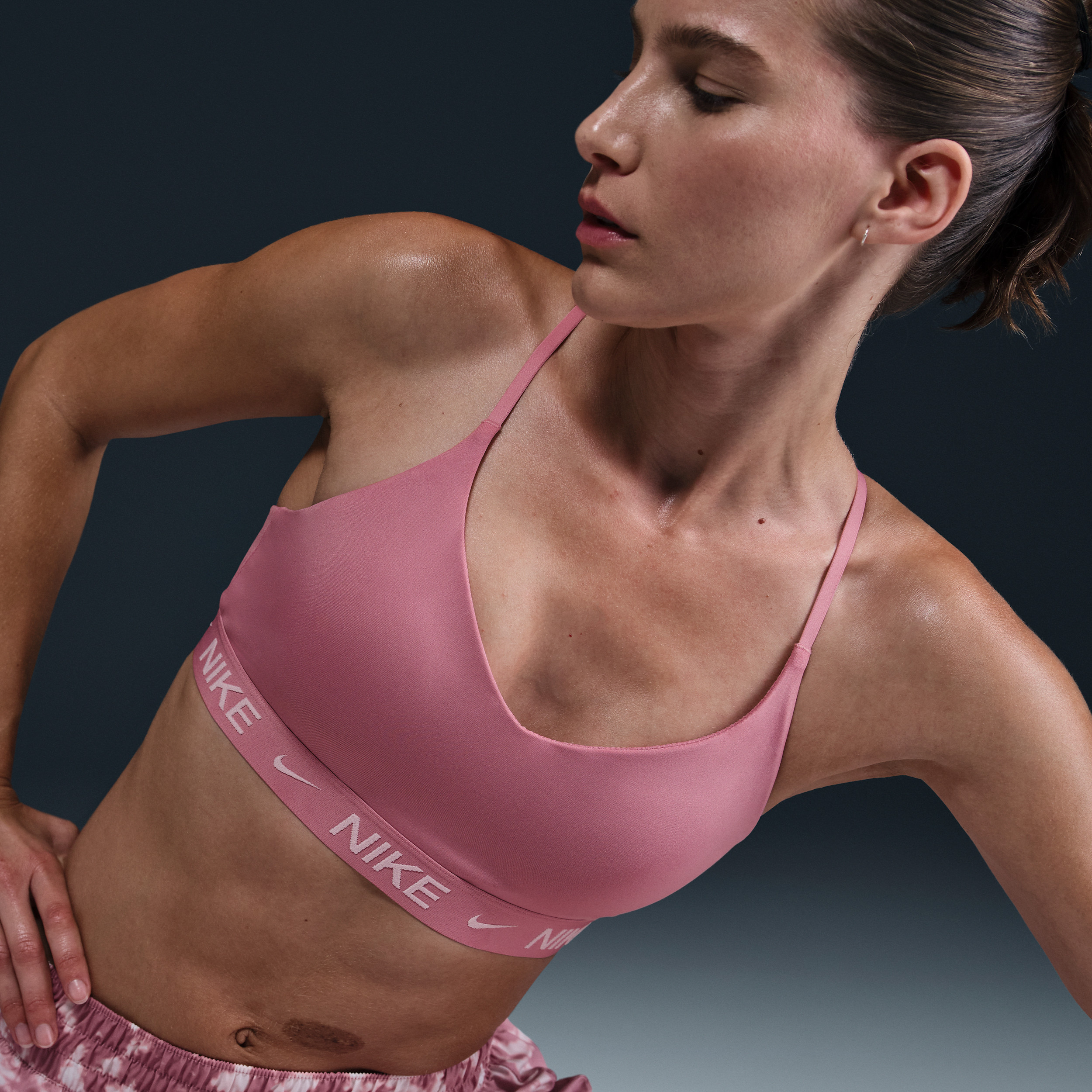 Nike Women's Indy Light Support Padded Adjustable Sports Bra in Pink | FD1062-699 | Nike (US)