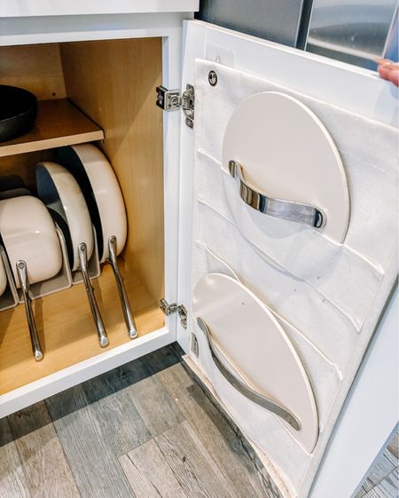 This cabinet-door-mounted pot lid holder is a genius way to store lids and keep them easily accessible. Plus the vertical dividers make the pans super accessible in the cabinet! 🥘

These Caraway cookware sets are all the rage - for good reason - and having built in storage makes them top notch in our book!