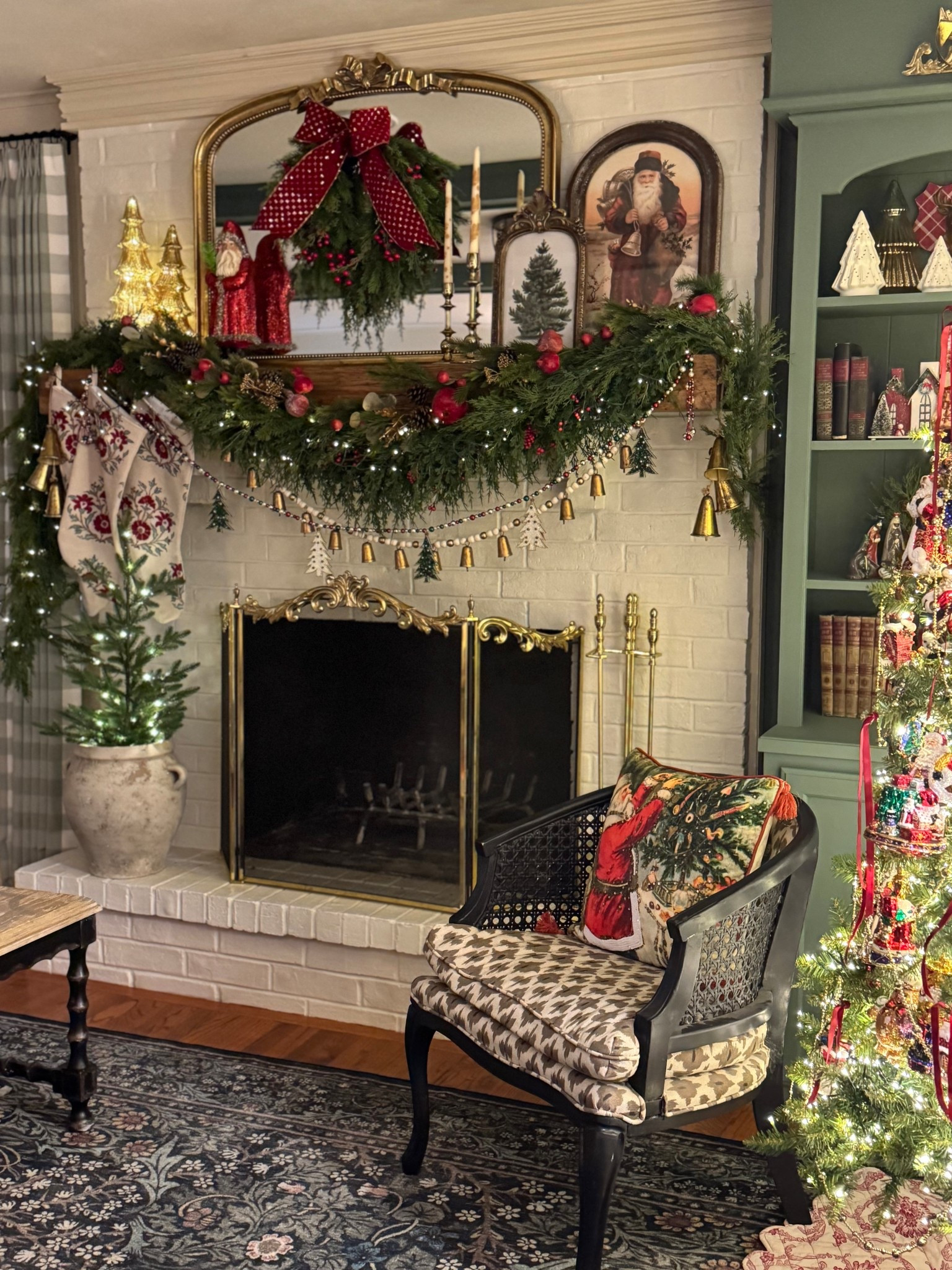 Christmas mantle decor, vintage brass fireplace screen, garland, art, Christmas pillow

#LTKSaleAlert #LTKHome #LTKHoliday