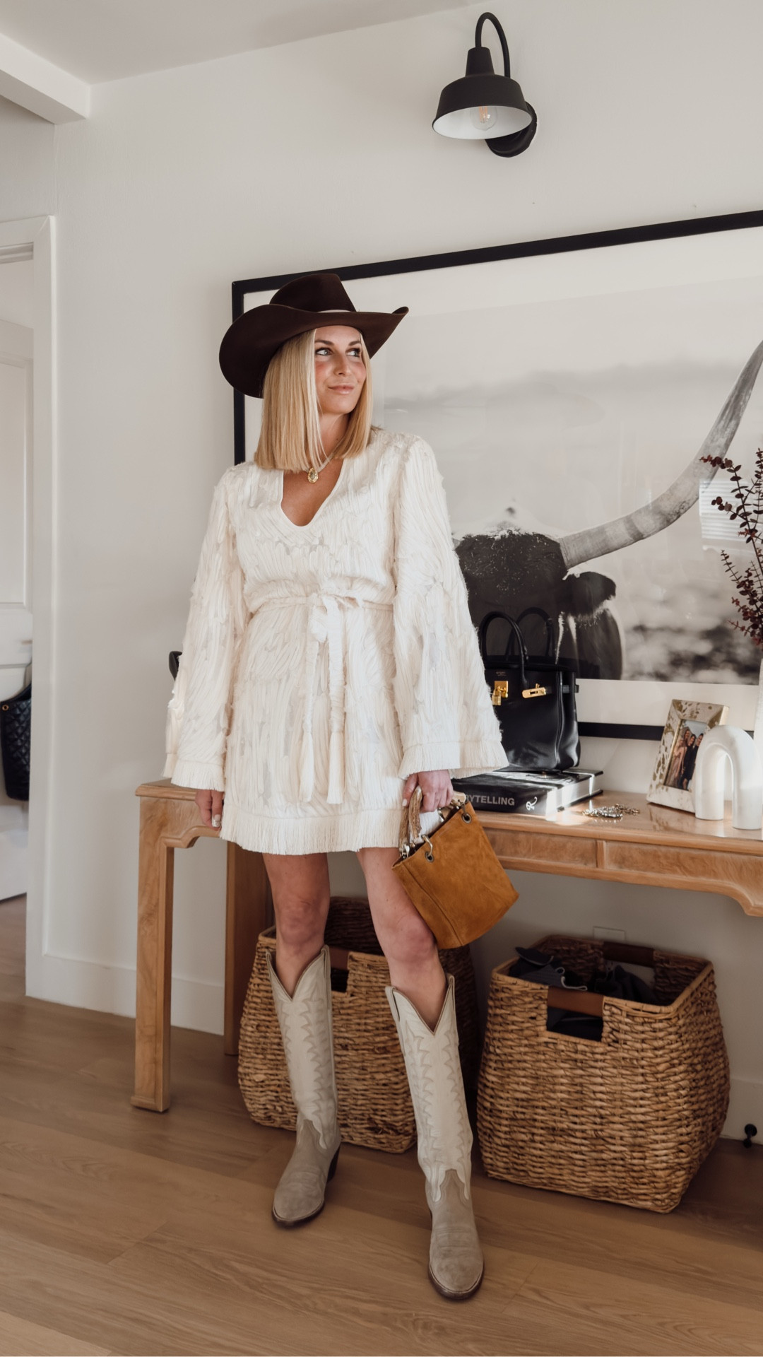 The most gorgeous white fringe dress! Runs big 

#LTKstorytime #LTKgrwm #LTKootd