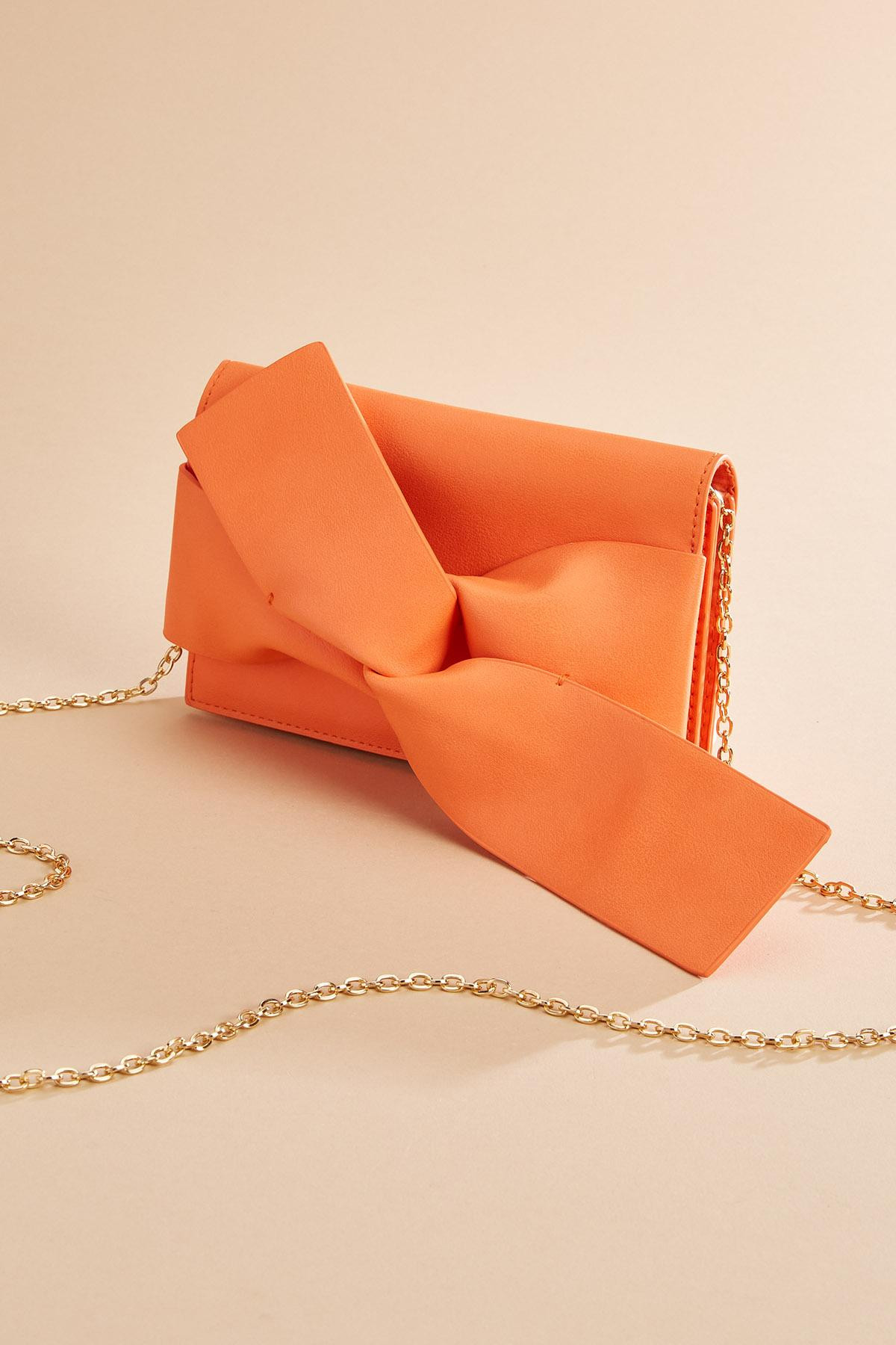 faux leather bow clutch | Versona