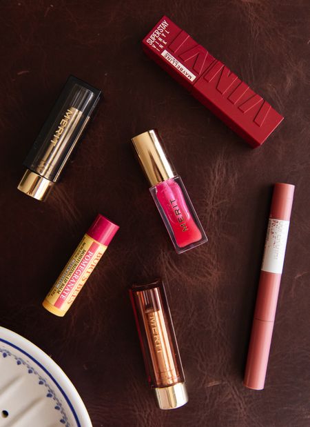 My six tried & true lipsticks that are always in my purse! Been wearing some of these for years.

Merit Shade Slick (Les Deux), Burt’s Bees Pomegranate chapstick, Merit Signature Matte Lip (Classic), Merit Signature Lip (Millenial), Maybelline Super Stay Ink Crayon (Lead the Way), Maybelline Super Stay Vinyl Ink (55 Royal, and a bonus, MatteTrance Lipstick by Pat McGrath (Eldon Red Blue) — Taylor Swift’s signature red lip!! 

#LTKstyletip #LTKfindsunder50 #LTKbeauty