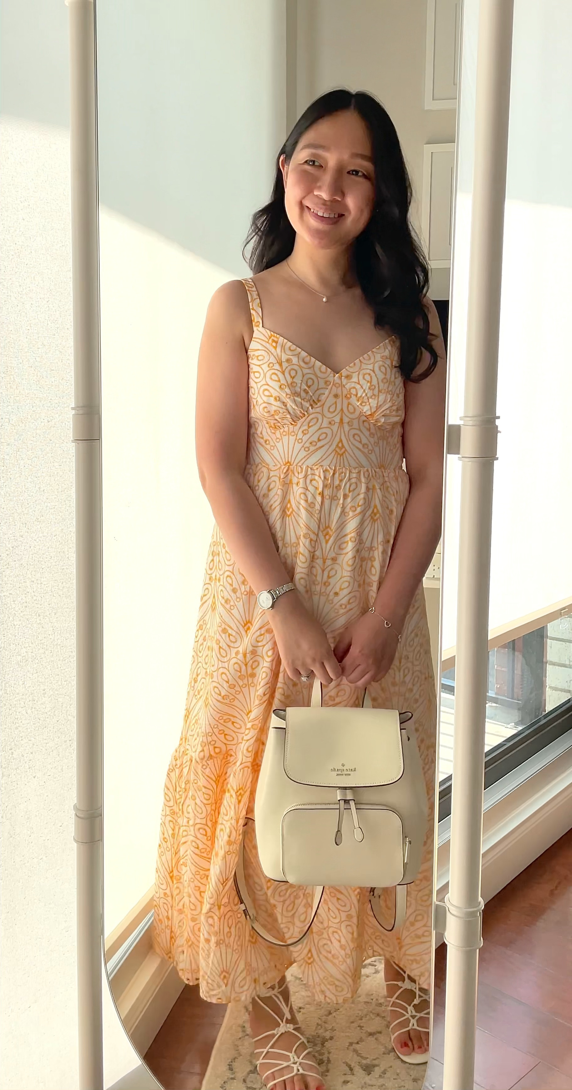 Get 50% off + free shipping at LOFT with code FLASH. I took this maxi dress in size 2P. It also comes in black. It has a cutout in the back. The dress is lined so the skirt portion is not see through.

My white sandals are $28.

This Kate Spade backpack (available in black and more colors) is also on extra sale (final sale). I also linked to some pretty sandals that I was eyeing.

I love the Conair Unbound for easy waves. You can find my review/tutorial in my 'Hair & Beauty' collection on my LTK shop.

#LTKsalealert #LTKunder100 #LTKunder50