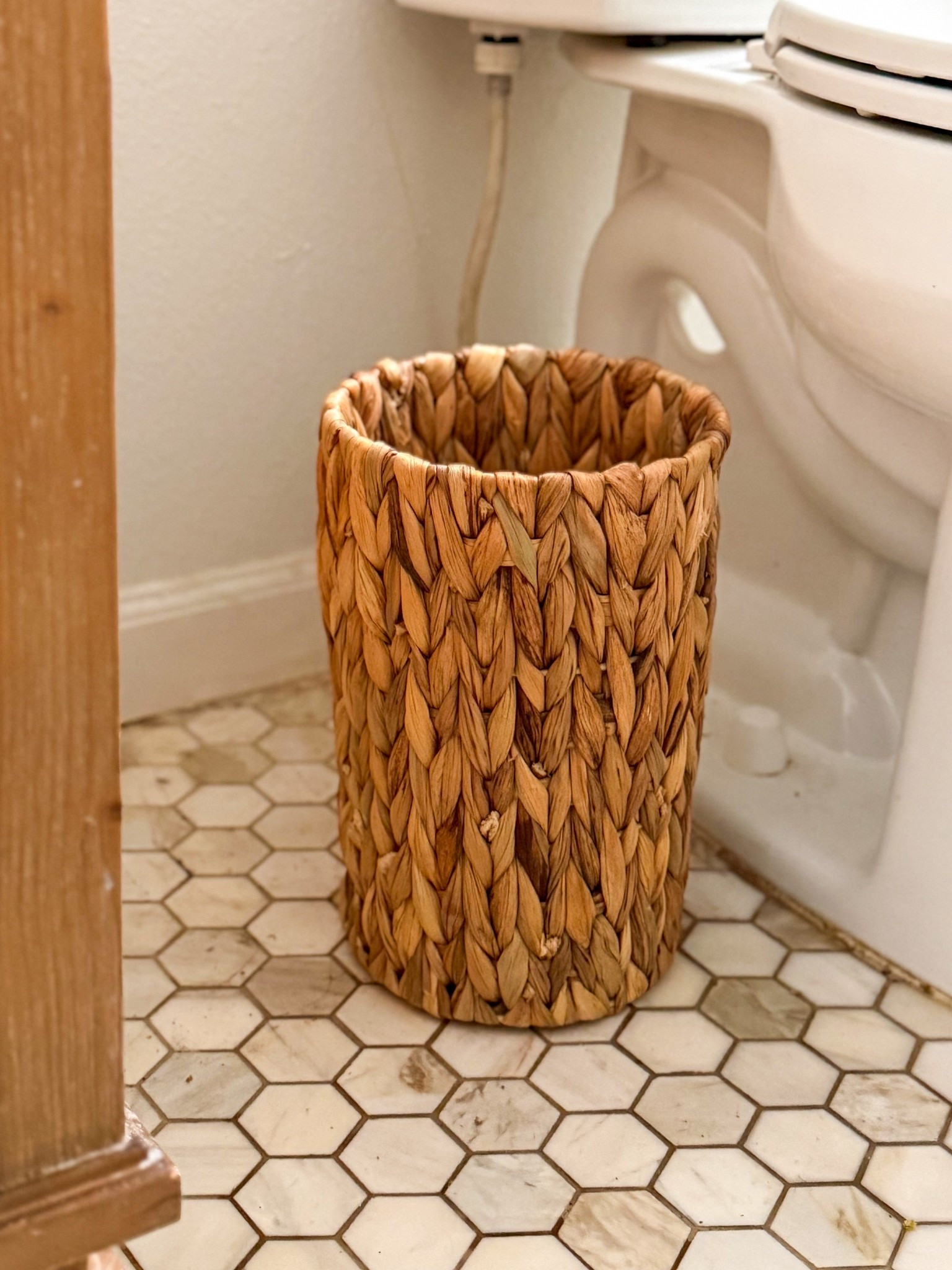 January is a great time to clean and organize your home! This woven waste basket is the perfect garbage and will elevate your bathroom! @wayfair has everything you need to redecorate, remodel and organize your guest bathroom or primary bathroom! #newyearnewyou #ad #wayfair #wayfairpartner 

#LTKFindsUnder100 #LTKSaleAlert #LTKHome