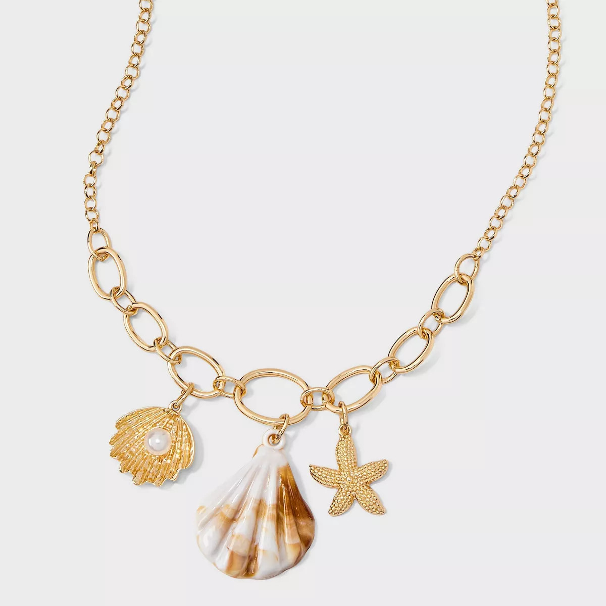 Shell And Starfish Drop Long Necklace - A New Day™ Neutral/Gold | Target