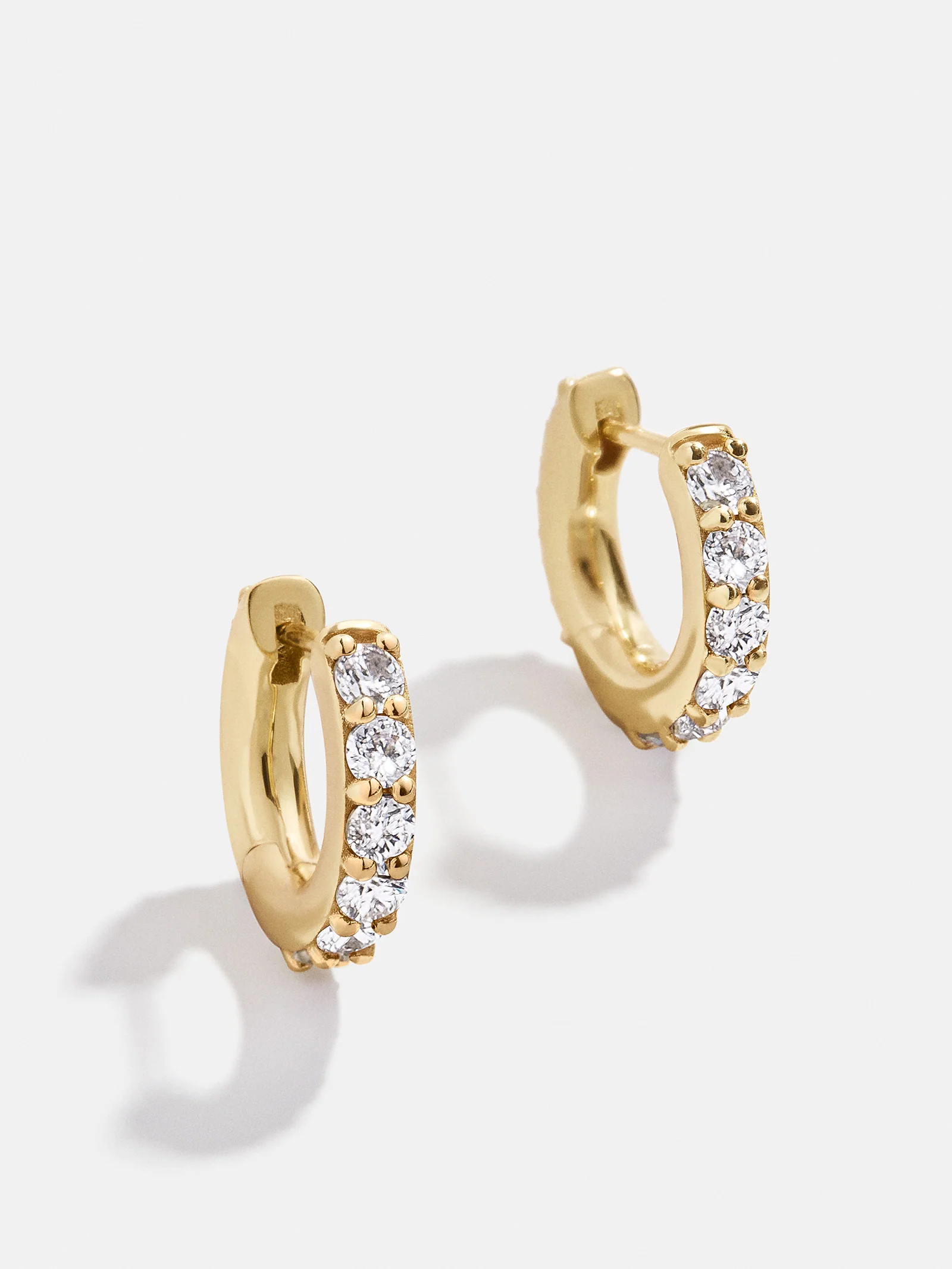 18K Gold Birthstone Huggie Earrings - Crystal | BaubleBar