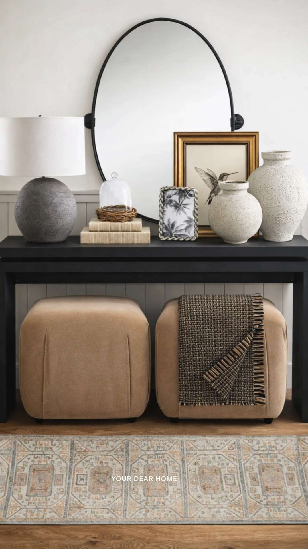 Black console table styled with warm neutrals, layered textures, and classic decor pieces that create a grounded, high-end entryway moment. 

 #LTKHome