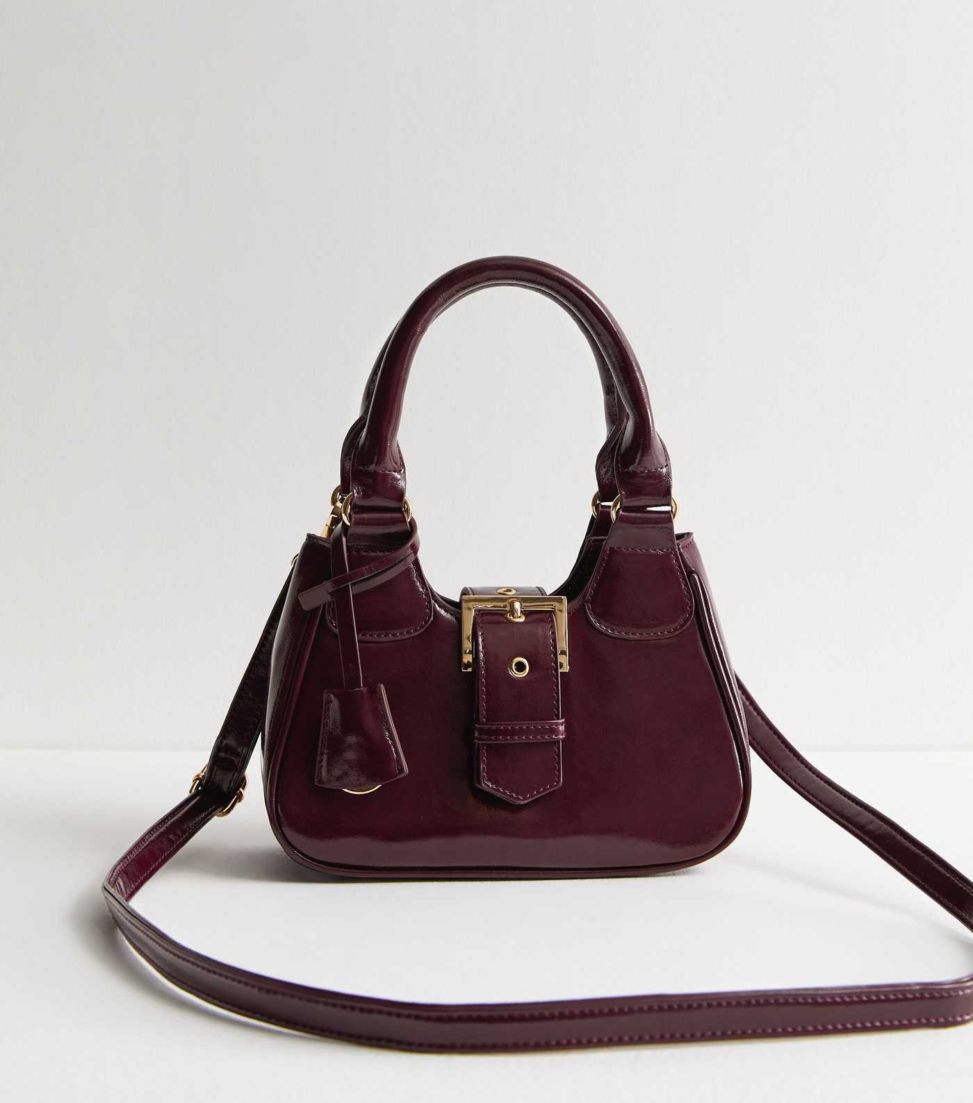 Burgundy Leather-Look Buckle Crossbody Mini Bag  | New Look | New Look (UK)