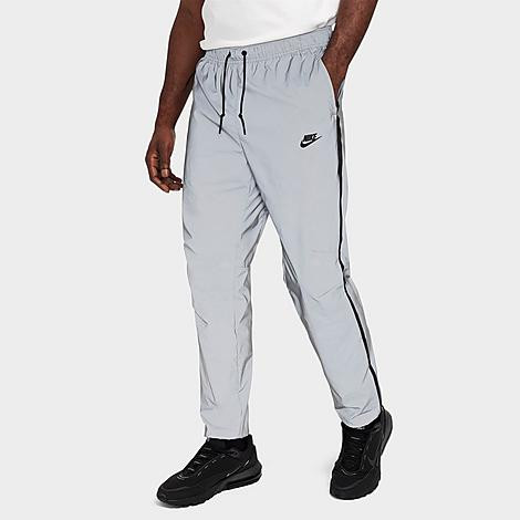 Nike Men's Tech Woven Flash Jogger Pants in Reflective Silver/Black Size: Large | Finish Line (US)