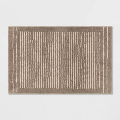 2'6"x4' Washable Knitted Stripe Accent Rug Tan - Threshold™ | Target