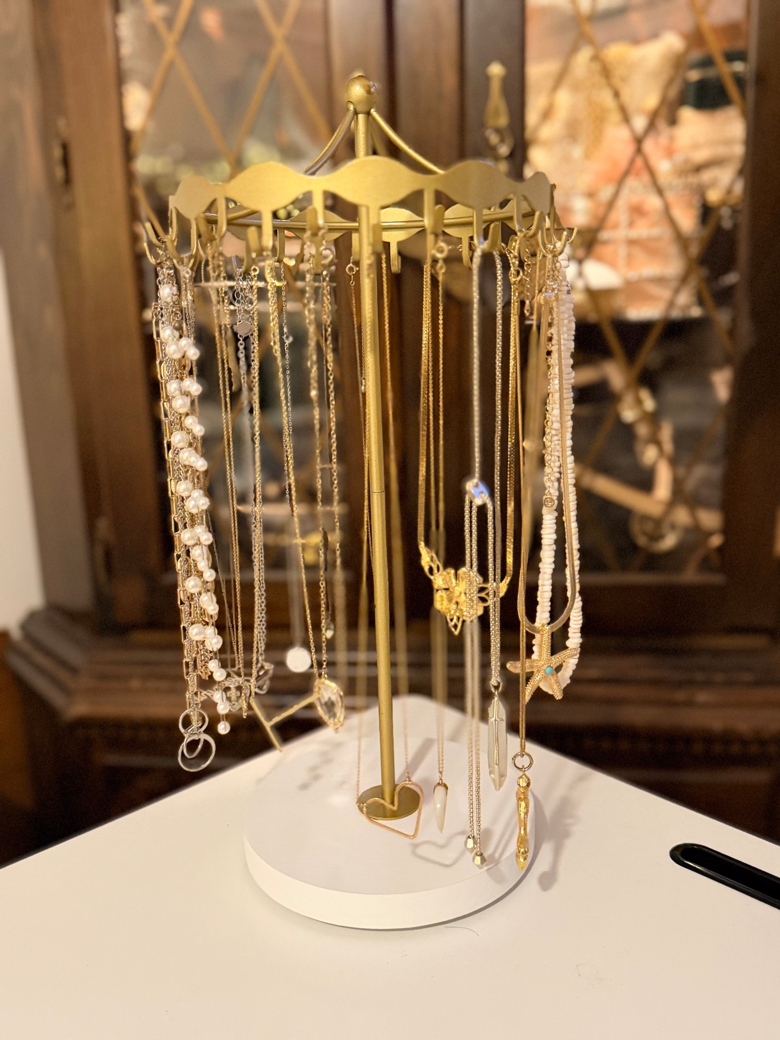 I needed a cute way to hang my necklaces + when I found this + it’s resemblance to a carousel I was sold. It comes in 3 different color options as well 

#LTKgrwm #LTKHome #LTKdayinmylife