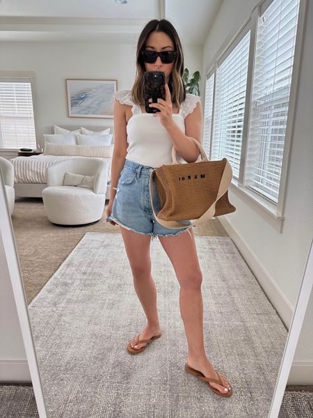 Gap spring/summer try-on. Cute tank tops for summer. Ribbed with cute details on the strap. Tucks into bottoms well. On sale!

Gap flutter tank xs
AGOLDE DEE shorts 26. Sizes up 2 sizes. 
Tkees sandals 5
Marni tote small
Celine sunglasses. 

Sandals, summer outfit, petite style, white top. 

#LTKsalealert #LTKitbag #LTKunder50