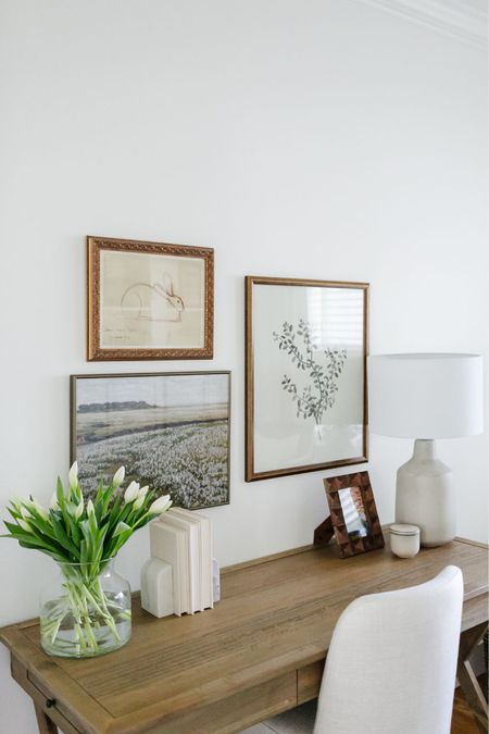 I love to add spring and summer touches to my home office. In this shot, you will see that to my World Market deskI added a glass vase with pretty fresh flowers. Above the desk, I have added some pretty summer artwork.

#LTKstyletip #LTKSeasonal #LTKhome
