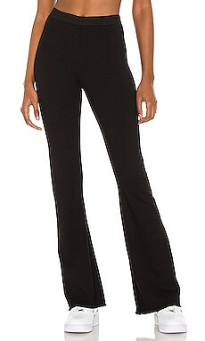 Indah Penne Solid Bootcut Pant in Black from Revolve.com | Revolve Clothing (Global)