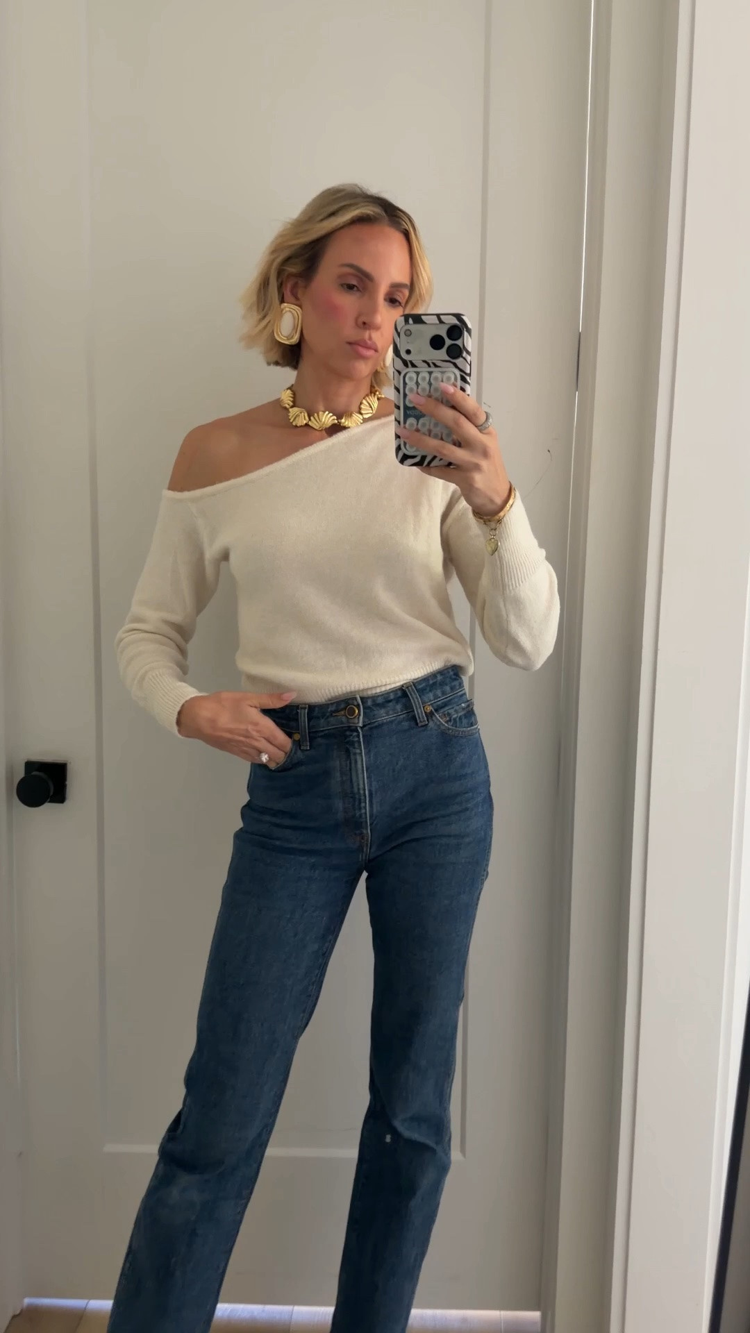 Wearing a small in the top. Jeans are my favorite jeans in the entire world and they run TTS. I love that these earrings are giving Saint Laurent vibes, but without the Saint Laurent price ￼￼

@12th Tribe

#LTKootd #LTKOver40 #LTKdayinmylife
