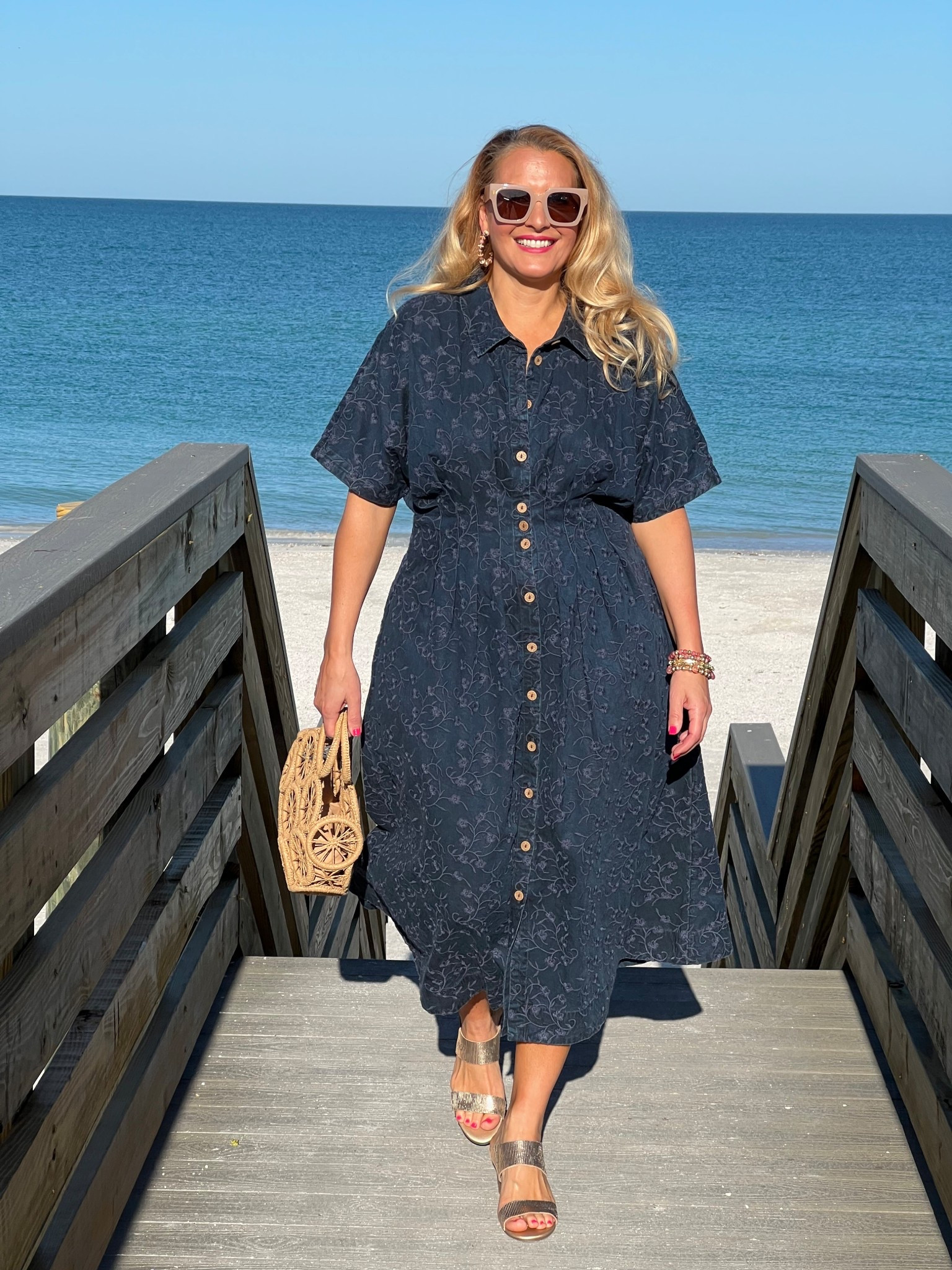 🏝️SOFT SURROUNDINGS DRESS: #ad Packing for a beach getaway? Here’s the dress you need! @soft_surroundings #softsurroundings

👗My embroidered short sleeve midi dress flatterers with front and back tucks that define your waist. Love the tonal embroidery and beautiful floral pattern. You can wear this meeting friends for a lunch date, a beach getaway or everyday wear. Effortless style + versatility + breathable fabric = The dress you need!

🫶🏻Truly looks like a sophisticated denim dress. Buttons down the front, has side pockets and so soft! I’m wearing a medium and it fits true to size. Available in XS-3X. Color: Embroidered medium wash.

👒When heading out to the beach, don’t forget to pick up my Catalina Cowboy hat! This raffia hat features a colorful braided faux suede hatband and has an interior adjustable sweatband that makes it comfy. Also love the shapeable three inch brim to offer extra sun protection. 

🙌🏼In addition to my hat, I’m wearing a set of five bracelets with matching earrings. The genuine rhodonite beads in pinks, golds and earth tones look fantastic for spring and summer.

👡You can’t forget about these insanely comfortable textured sandals. Obsessed! This golden leather sandal has a soft shimmer and glow. Elevated and chic. You’ll be reaching for these all spring and summer long. I walked around all day and my feet felt great. Order your normal size. These are fantastic!

👉🏼Follow my shop @jtstjtst11 on the @shop.LTK app to shop this post and get my exclusive app-only content!

#liketkit 
@shop.ltk

#LTKSeasonal #LTKOver40 #LTKSaleAlert #LTKU #LTKTravel #LTKgrwm #LTKootd #LTKMidsize #LTKSwim #LTKFestival