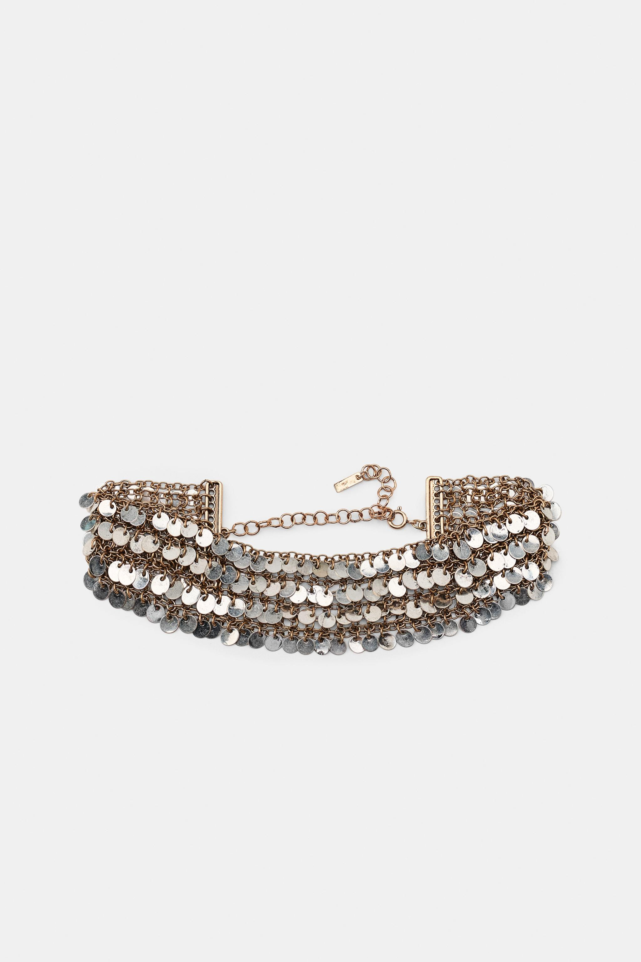 Model height: 180 cmContrast choker-style necklace, 3 cm wide, featuring multiple metal links and... | Zara UK