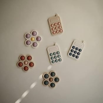 Amazon.com: mushie Flower Press Toy (Soft Lilac/Daffodil/Ivory) : Toys & Games | Amazon (US)