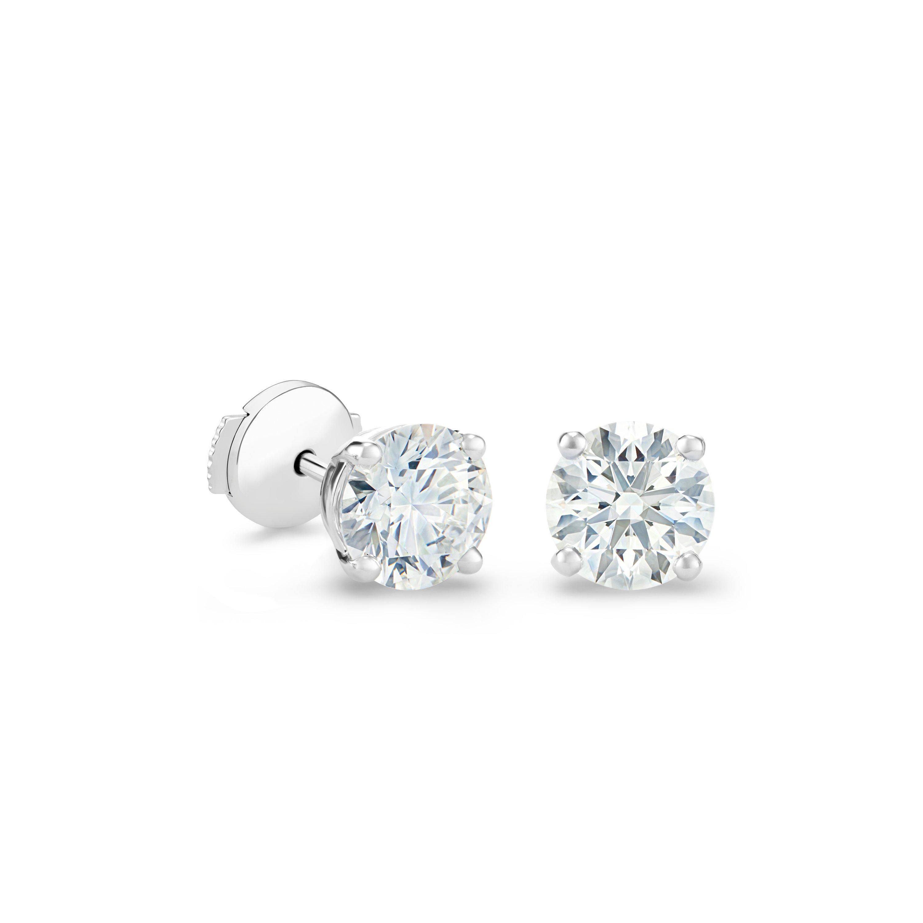 DB Classic round brilliant diamond studs | De Beers Jewellers