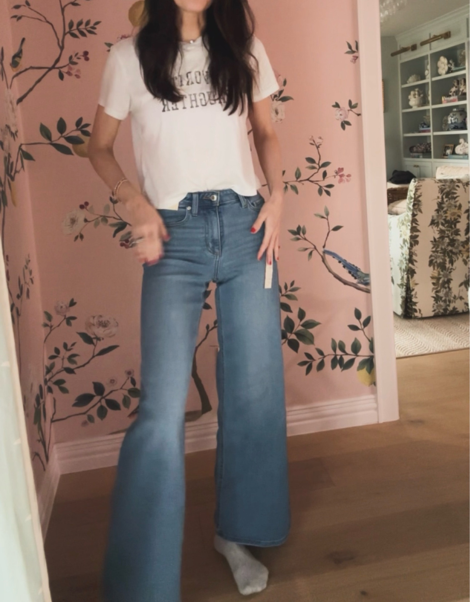 The viral target jeans. Size up a full size. I usually wear a 2 and am wearing a 4 and they fit like a glove. 